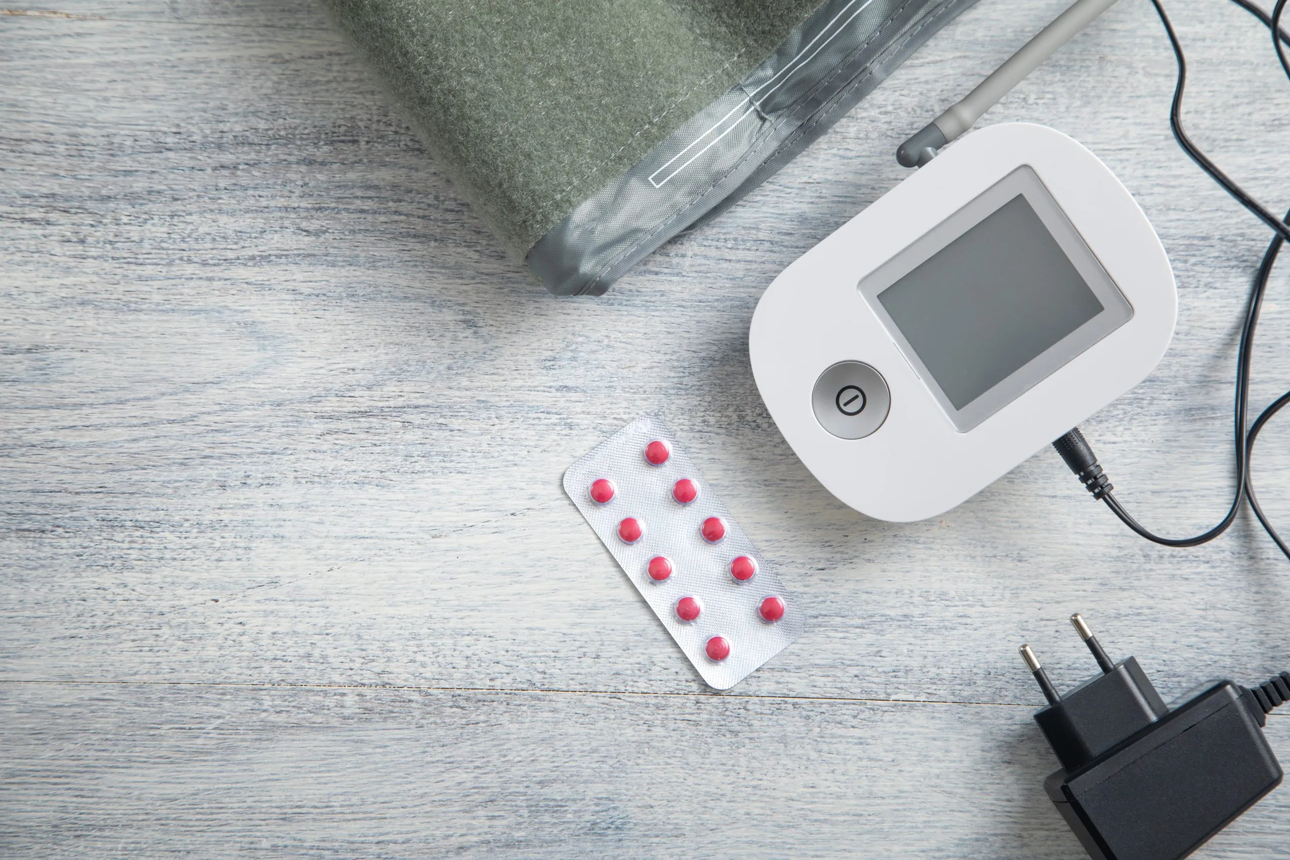 KSA TENS Units Devices Market Outlook 2035 digital-blood-pressure-machine-with-pills-table-scaled