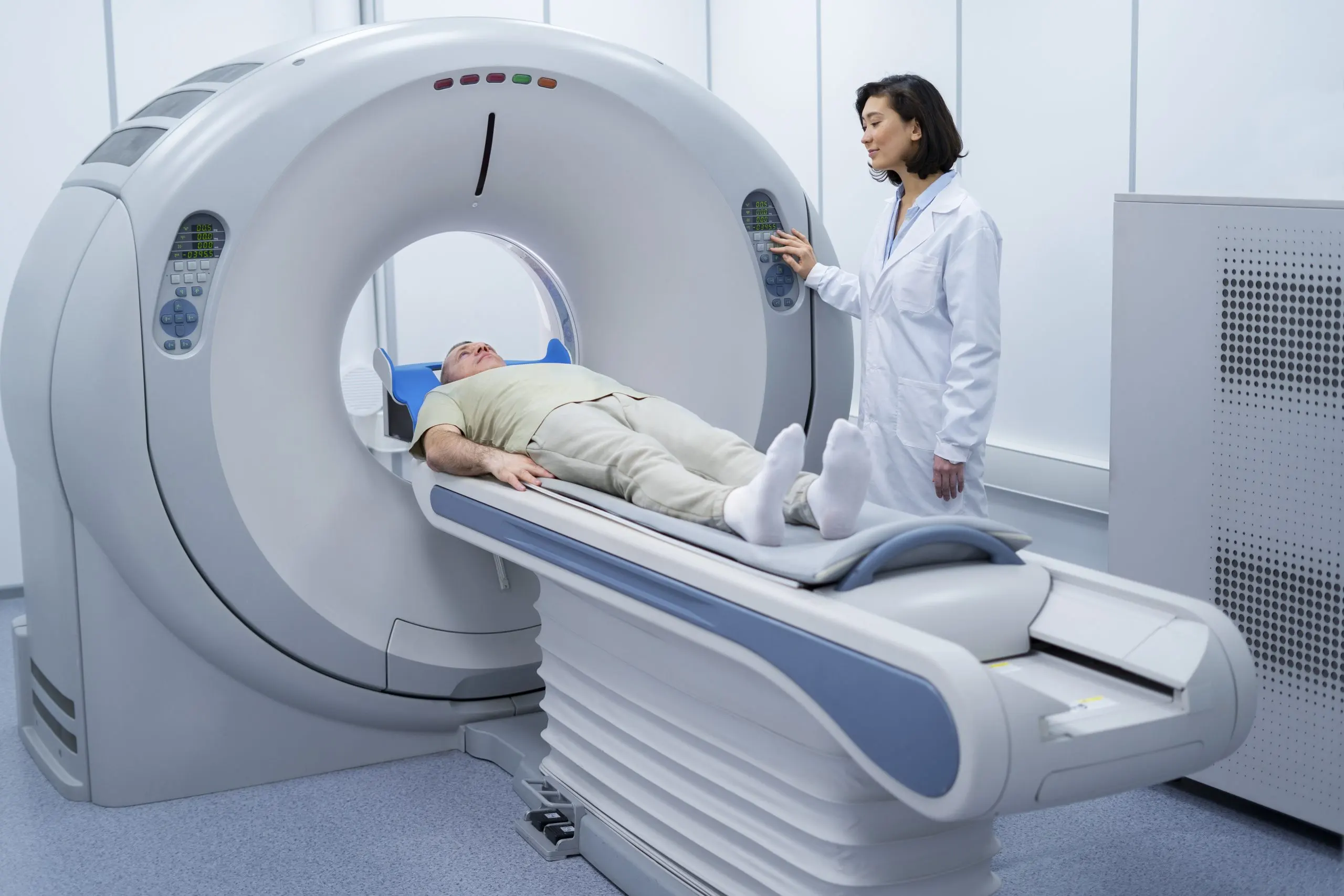 UAE X-ray Machines Equipment Market Outlook to 2035 doctor-getting-patient-ready-ct-scan-scaled