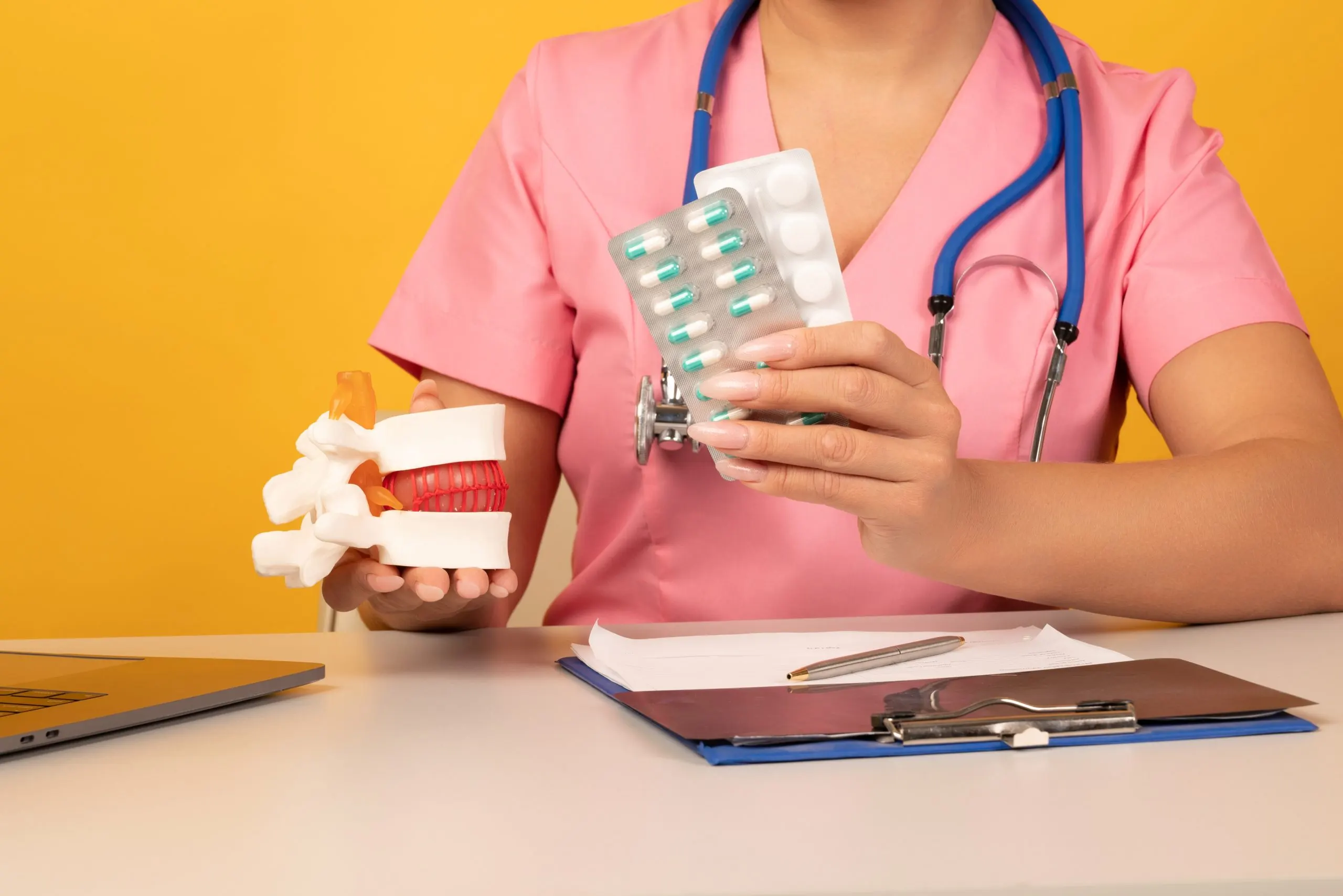 Philippines Oral Medications Market Outlook 2035 doctor-holds-anatomical-lumbar-disc-herniation-model-pills-closeup-protection-treatment-prevention-concept-intervertebral-hernia-treatment-scaled