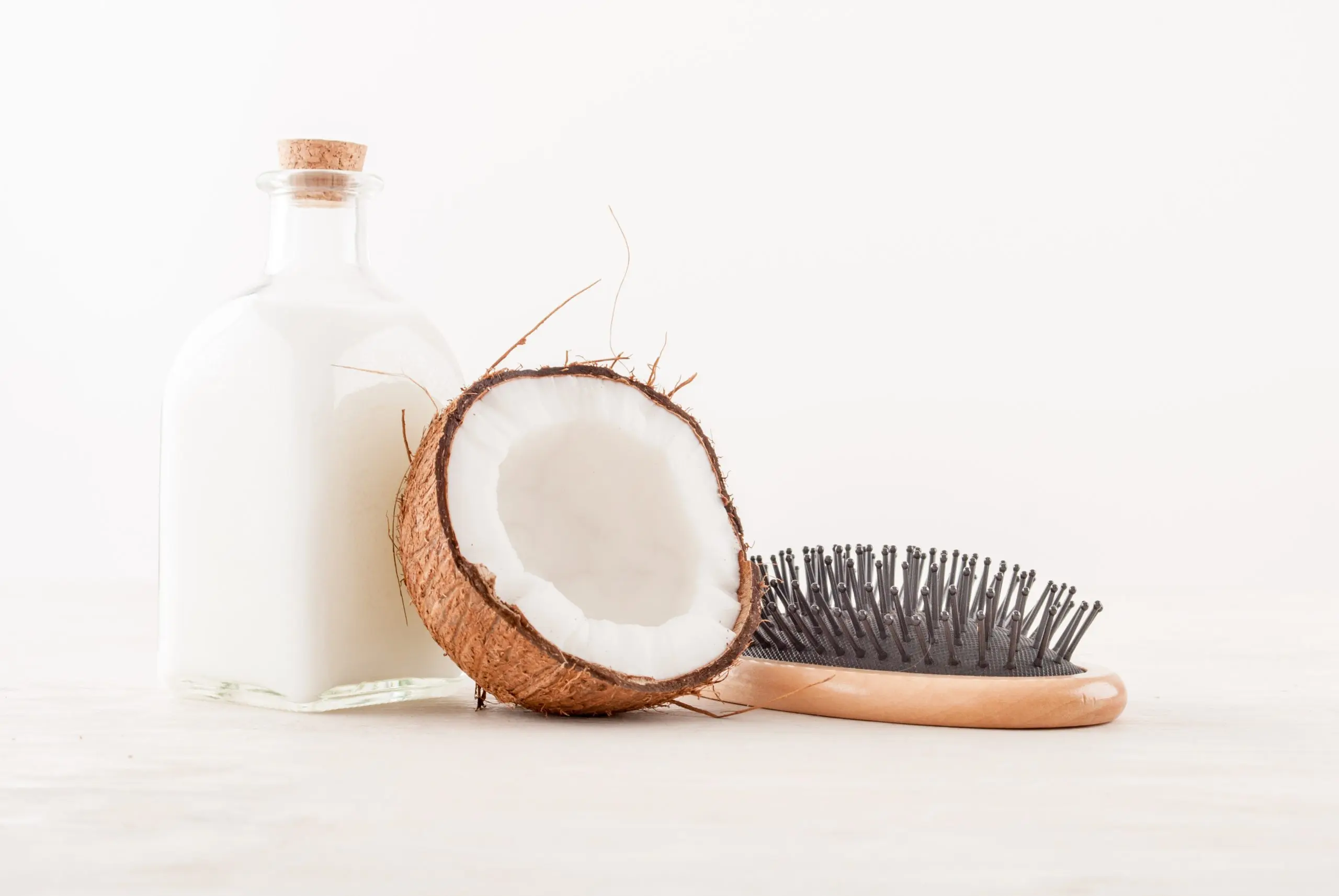 Philippines Hair Loss Treatment Products Market Outlook to 2035 hair-care-concept-with-coconut-oil-white-background-scaled