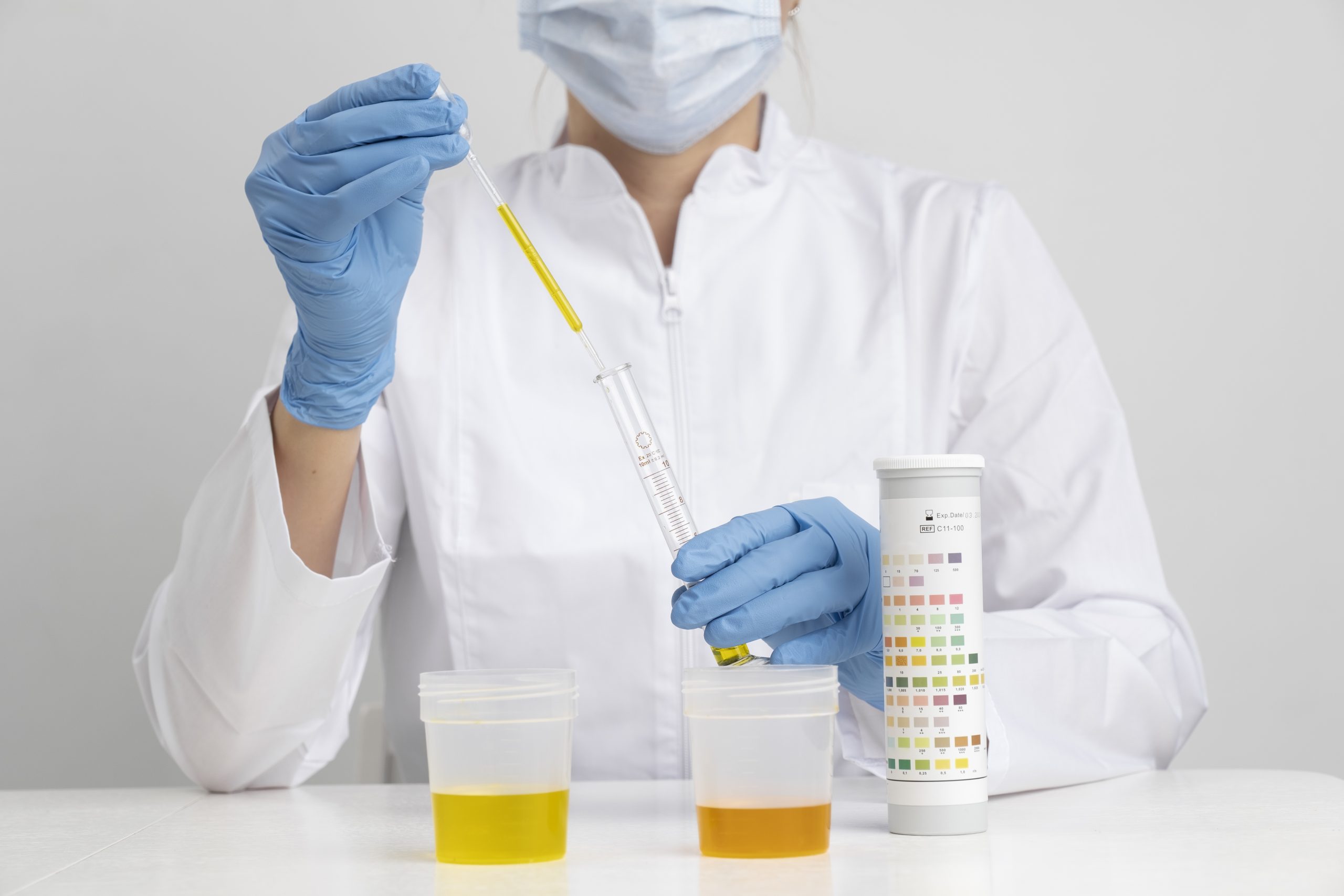 lab-doctor-performing-medical-exam-urine-scaled