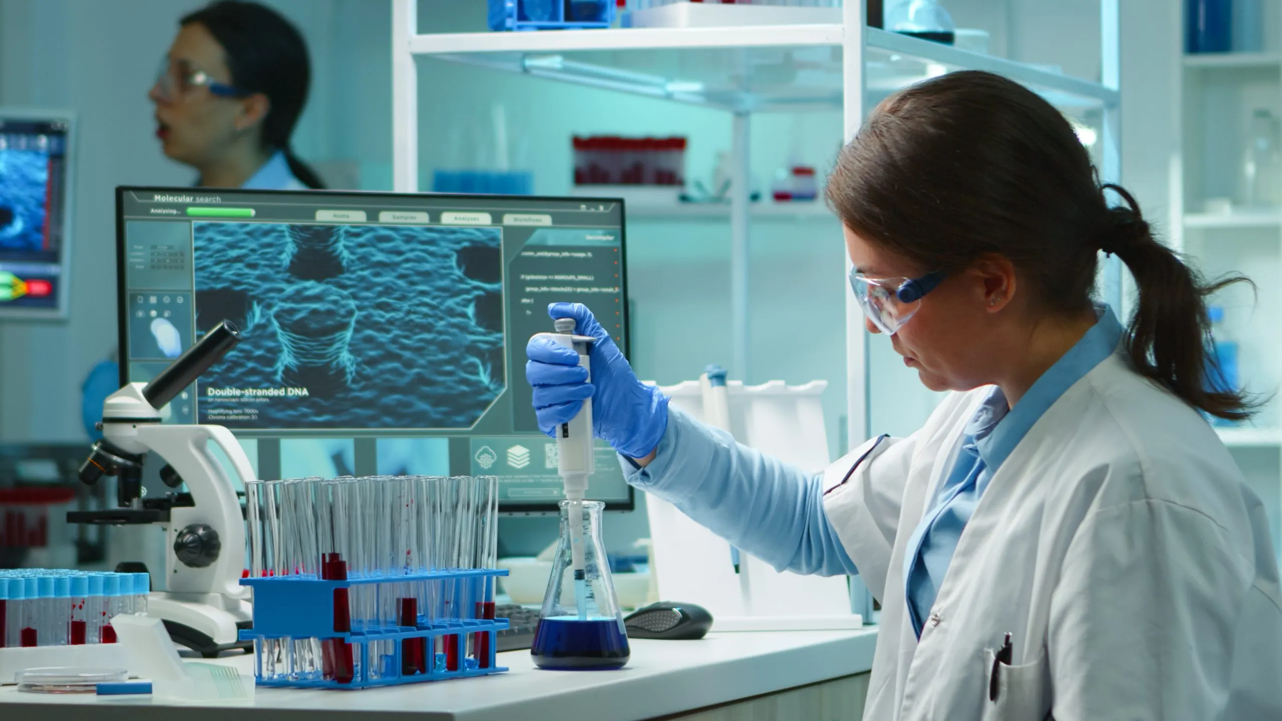 Philippines Diagnostic Biomarkers Market Outlook to 2035 scientist-woman-pipetting-liquid-test-tube-late-night-modern-equipped-lab-team-examining-virus-evolution-using-high-tech-scientific-analysis-treatment-development-against-covid19-scaled