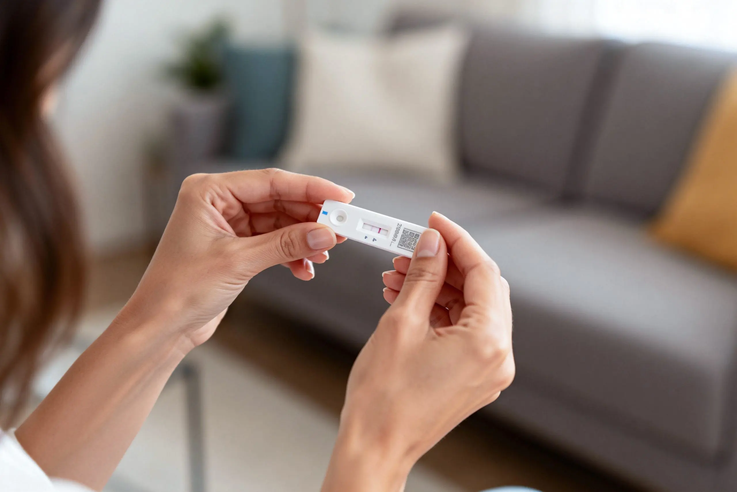 KSA Home Pregnancy Test Kits Market Outlook 2035 woman-holding-rapid-antigen-test-kit-home-scaled