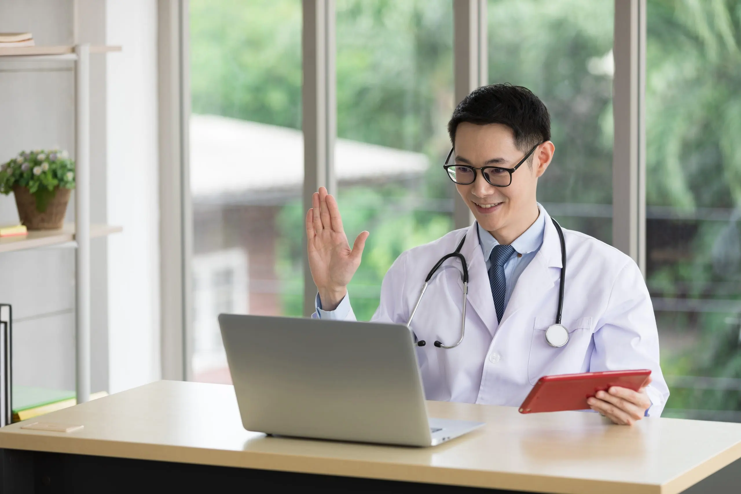 Thailand Telemedicine Adoption Rising 68% Transforming Healthcare Delivery Nationwide woman-using-mobile-phone-while-sitting-table-scaled