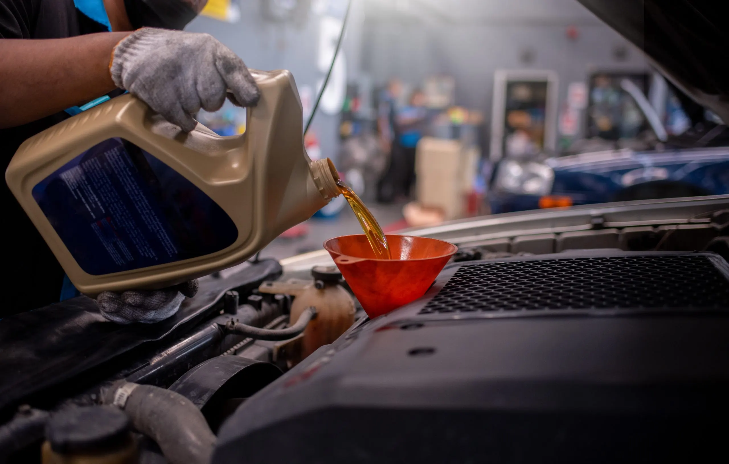 USA Greases Market Outlook to 2035 worker-scientist-industry-wearing-protective-safety-uniform-white-glove-gas-mask-clean-scaled