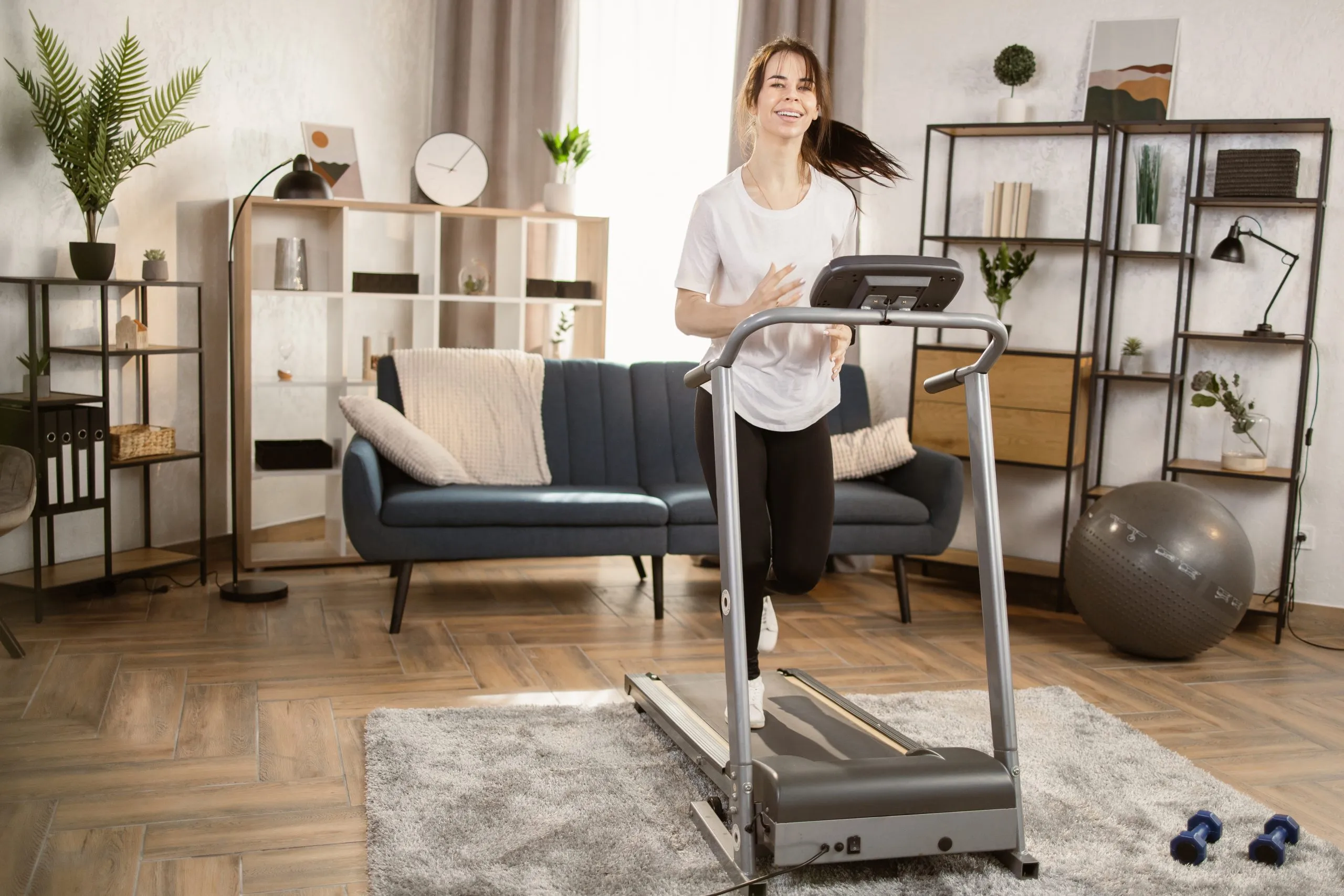 KSA Home Fitness Equipment Market Outlook to 2035 young-beautiful-woman-black-sports-leggings-white-tshirt-running-treadmill-home-scaled