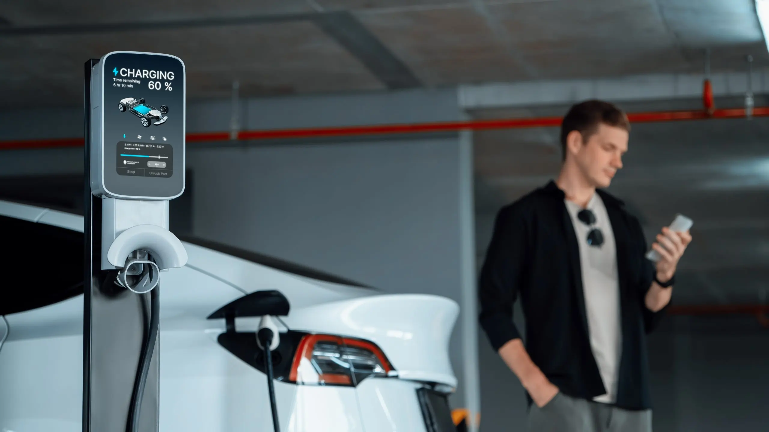 USA EV Batteries Market Trends Shaping Future Mobility Driven by 22% CAGR and Rapid Electrification young-man-travel-with-ev-electric-car-shopping-center-parking-lot-innards-scaled