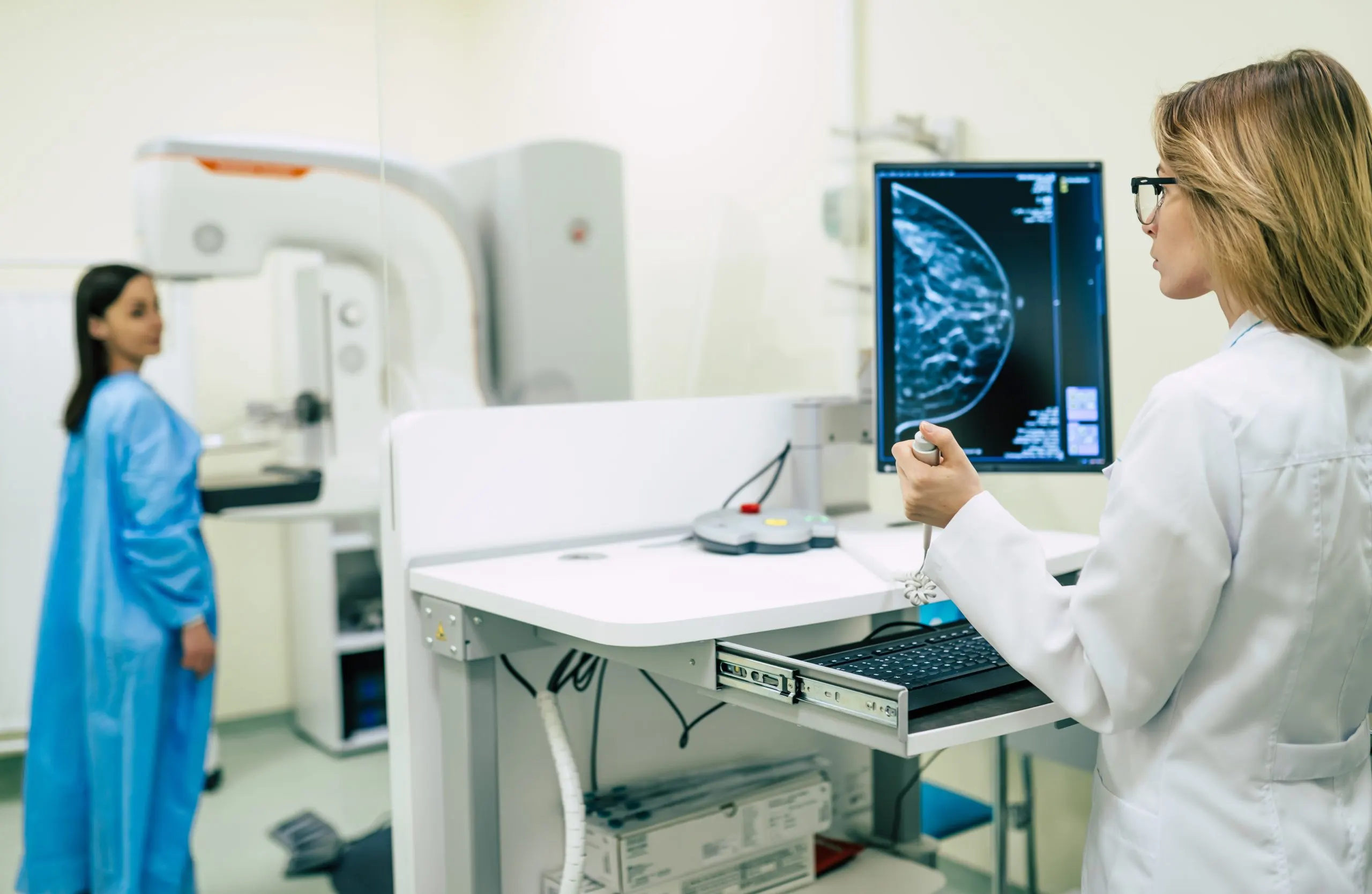 Philippines Digital Mammography Equipment Market Outlook 2035 young-woman-is-having-mammography-examination-hospital-private-clinic-with-professional-female-doctor-scaled