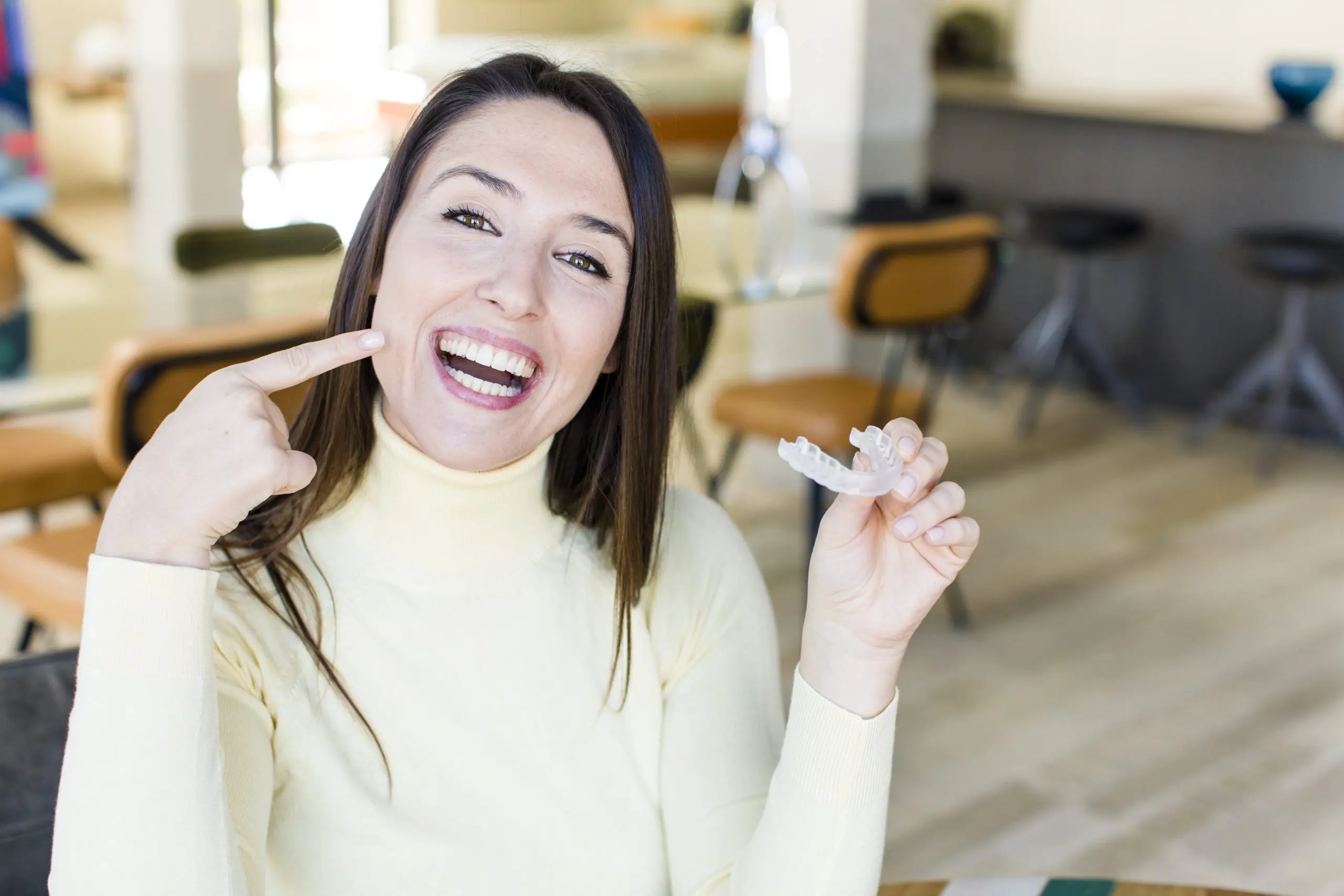 KSA Teeth Whitening Market Outlook to 2035 adult-pretty-woman-with-dentar-retainer-home-interior-scaled