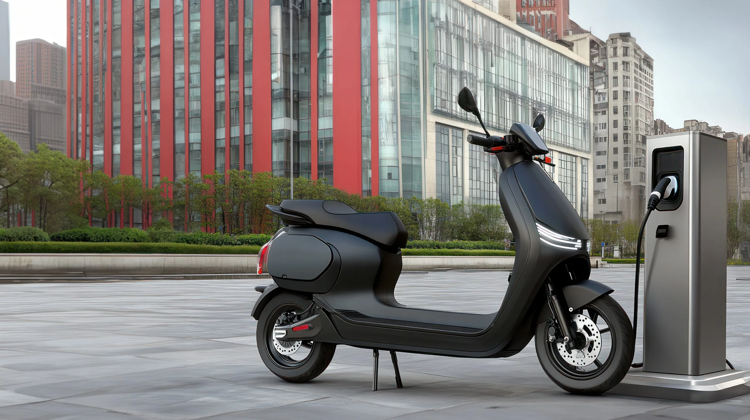 USA Electric Two-Wheeler Market Accelerated by Urban Mobility Demand and 11.36% CAGR Forecast black-electric-scooter-charging-urban-square-with-modern-buildings-background-eco-friendly-transportation-electric-scooter-smart-charging-scaled