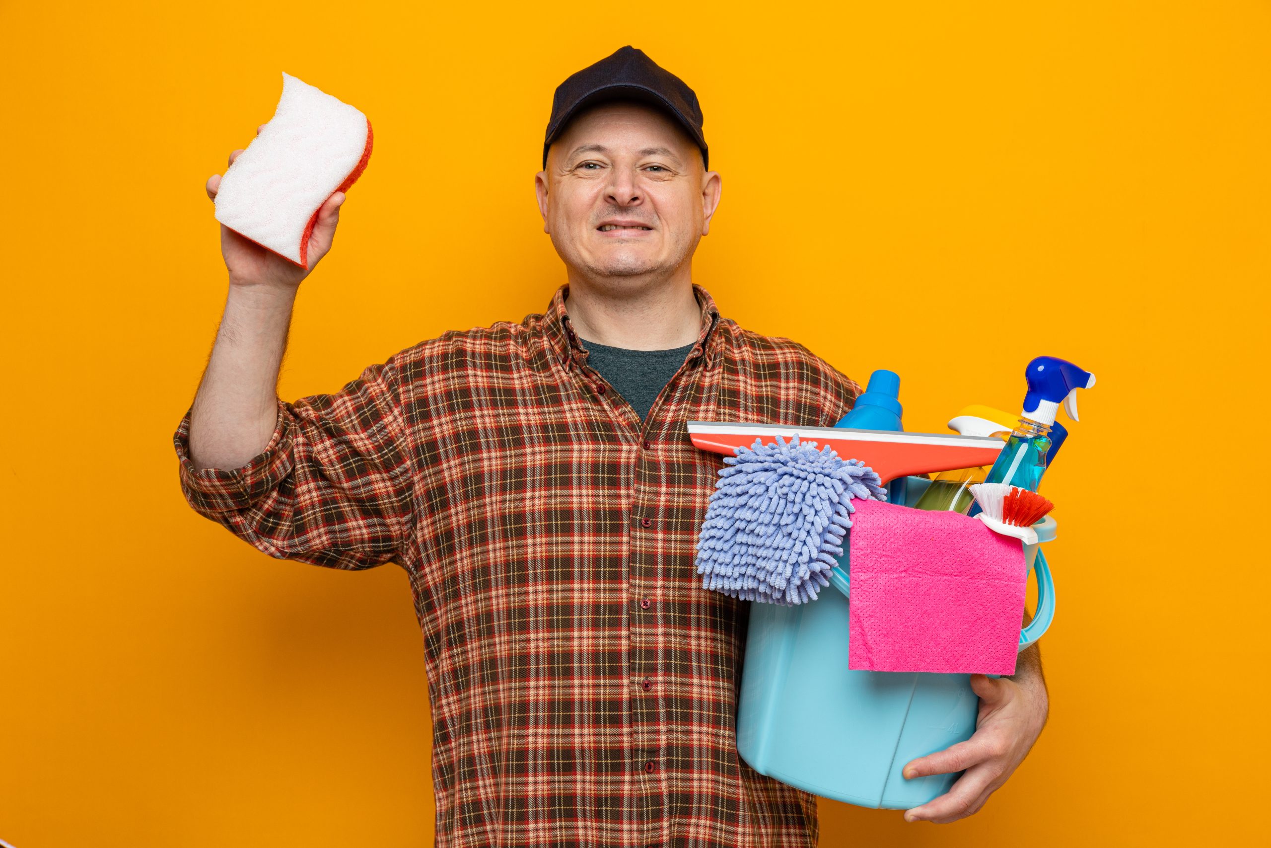 Philippines Household Cleaners Market Outlook to 2035 cleaning-man-plaid-shirt-cap-holding-bucket-with-cleaning-tools-sponge-looking-with-smile-face-scaled