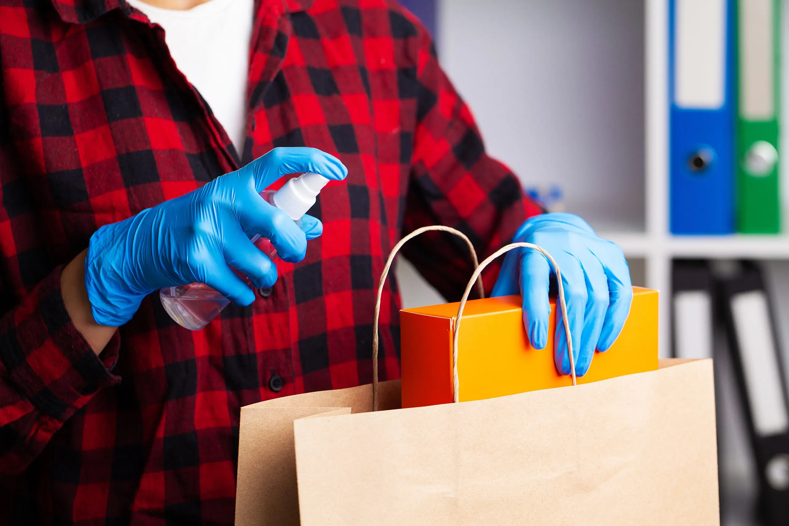 Rising Demand in the UAE Hand Gloves Market Showing $250M Revenue and 9% CAGR Opportunities and Challenges close-up-woman-protective-gloves-disinfecting-shopping-scaled