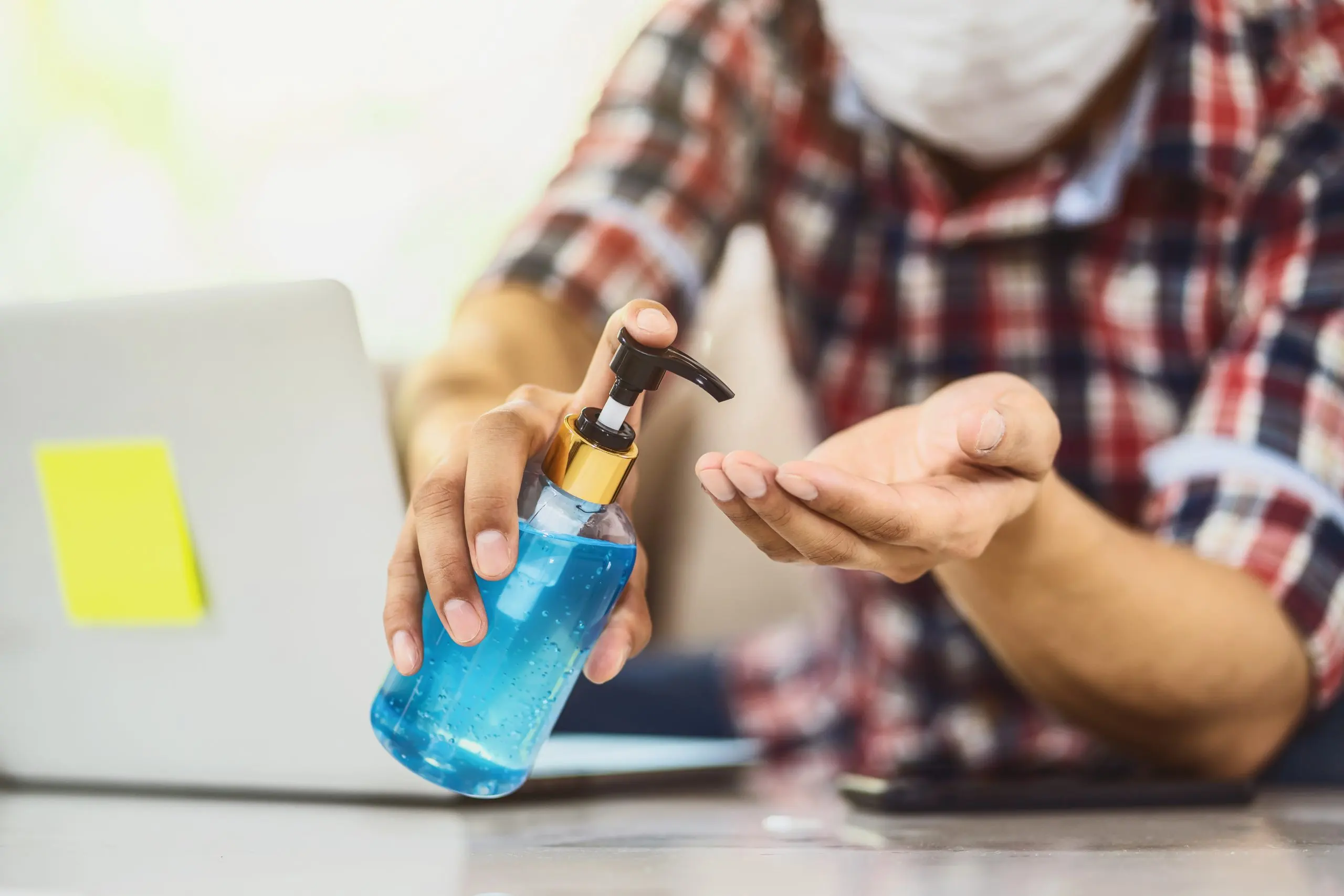 USA Hand Sanitizer Market Outlook to 2035 closeup-asian-man-using-hand-sanitizer-by-pumping-alcohol-gel-washing-scaled
