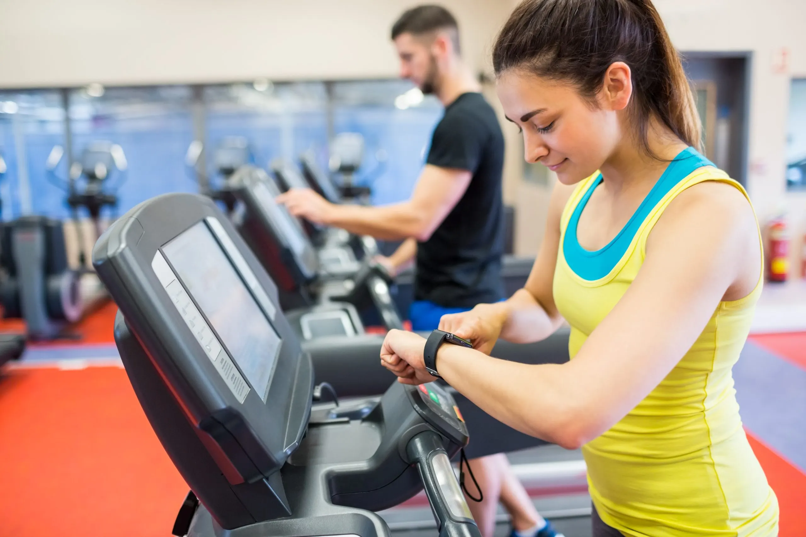 Nigeria Health and Fitness Club Market Outlook to 2035 couple-using-treadmills-together-1-scaled