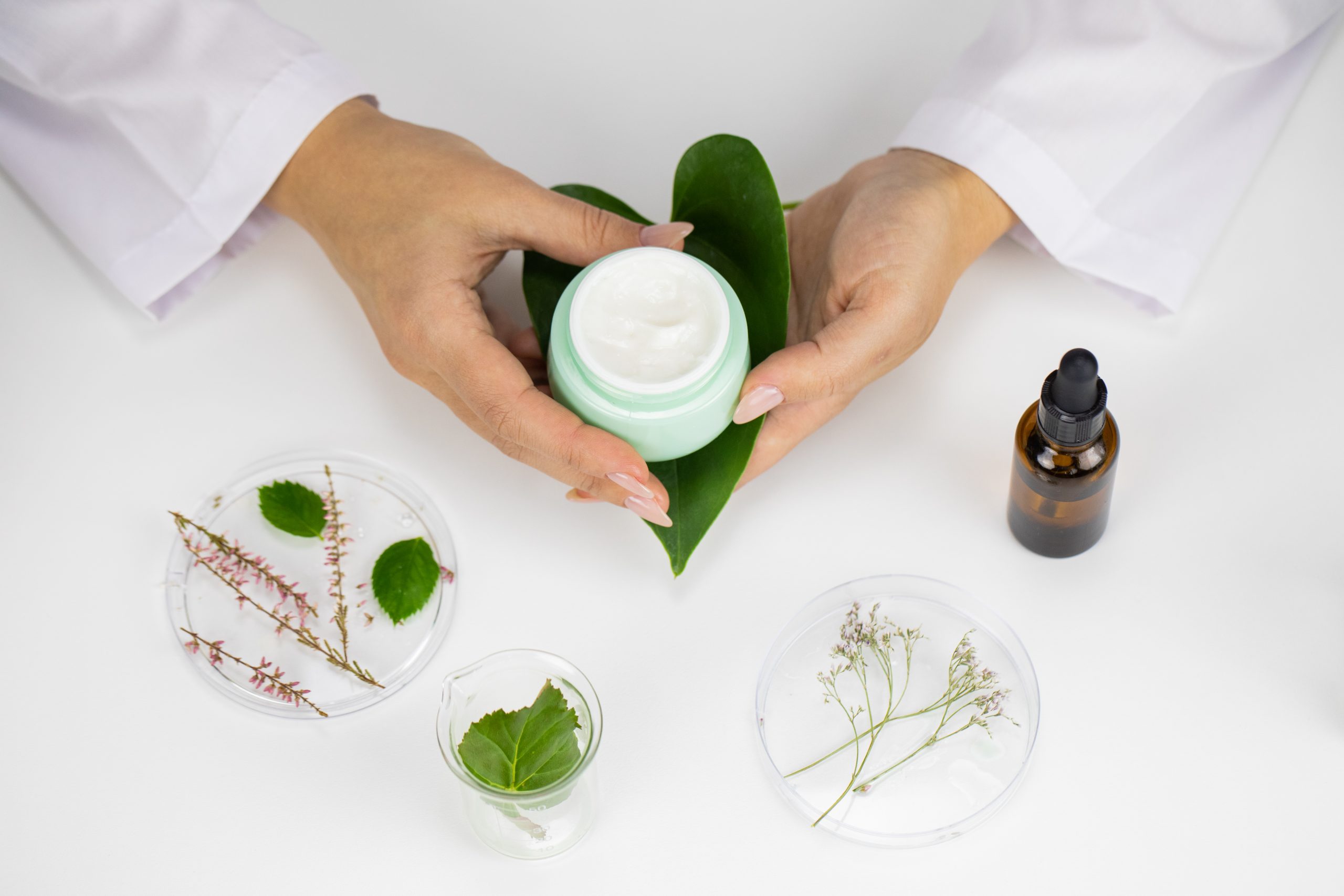 UK Vegan Cosmetics Market Analysis With 12 % Annual Growth and Rising Consumer Demand cream-jar-hands-white-laboratory-background-planbased-cosmetics-scaled