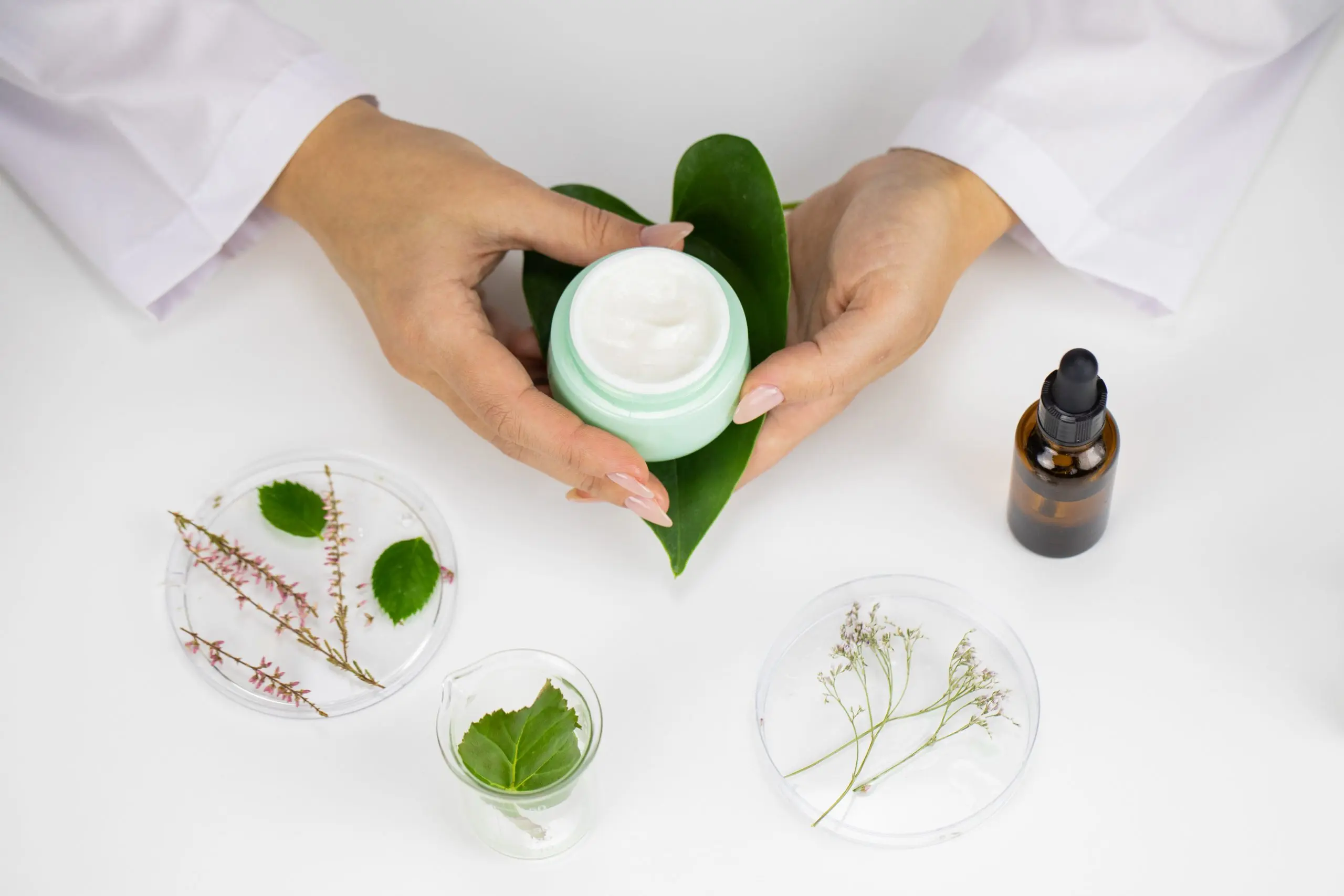UK Vegan Cosmetics Market Analysis With 12 % Annual Growth and Rising Consumer Demand cream-jar-hands-white-laboratory-background-planbased-cosmetics-scaled