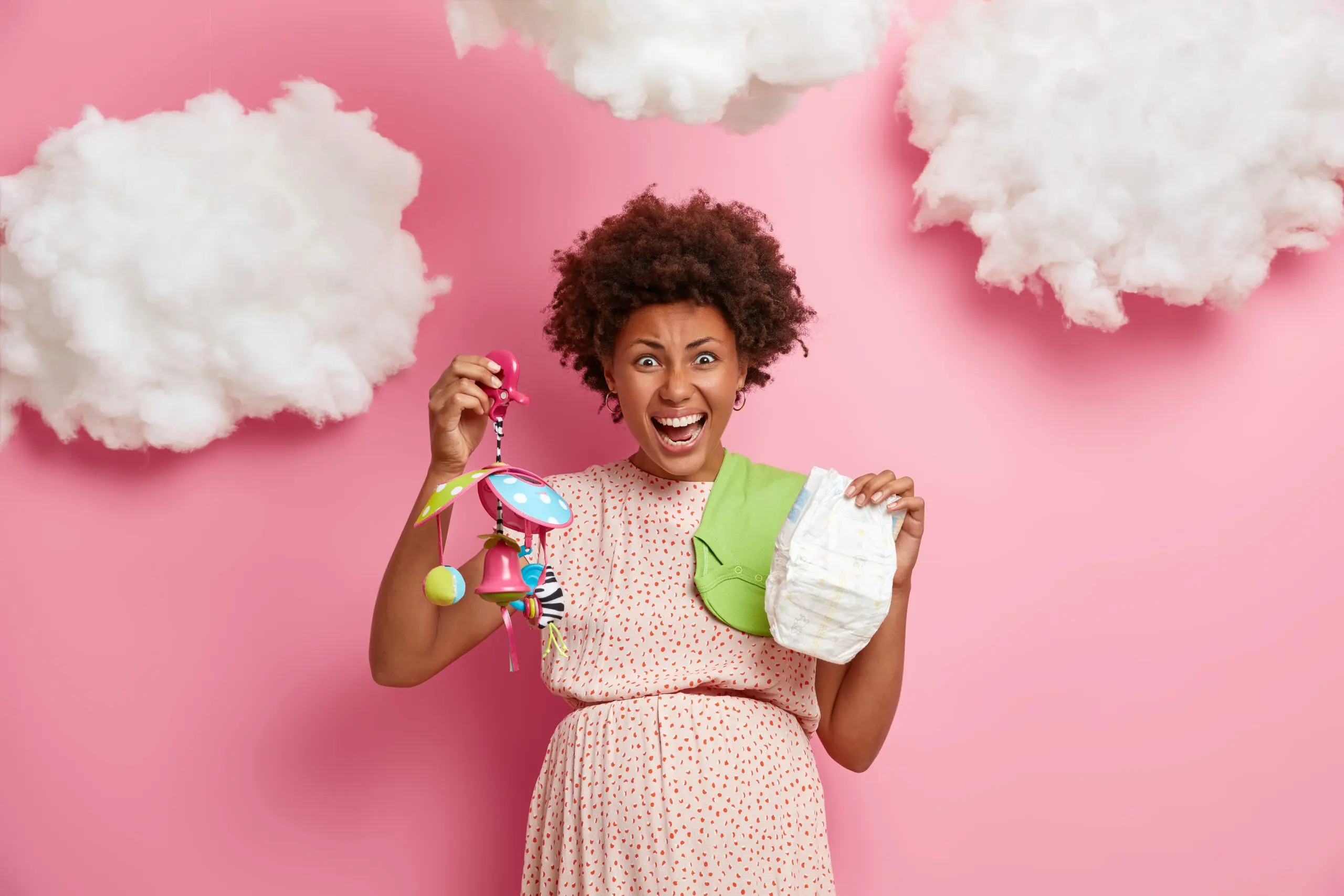 Brazil Adult Diaper Market Outlook to 2035 emotional-expectant-mother-shouts-emotionally-holds-diaper-baby-mobile-prepares-child-birth-wears-dress-prepares-baby-shower-poses-against-pink-wall-white-clouds-overhead-scaled