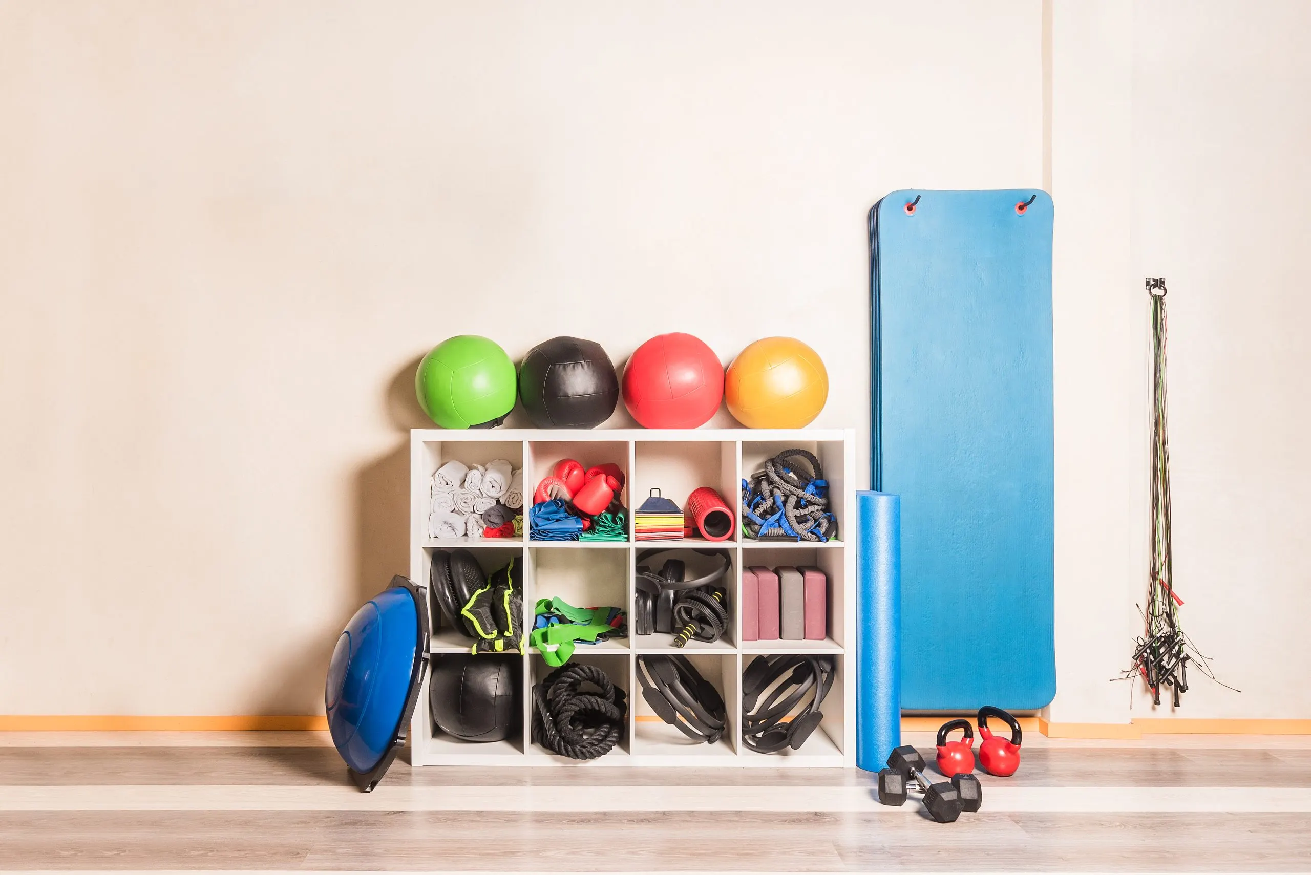 UK Home Fitness Equipment Market Analysis as Home Gyms Reach USD 28.9 Billion value front-view-gym-equipment-arranged-shelves-wall-concept-gym-equipment-scaled