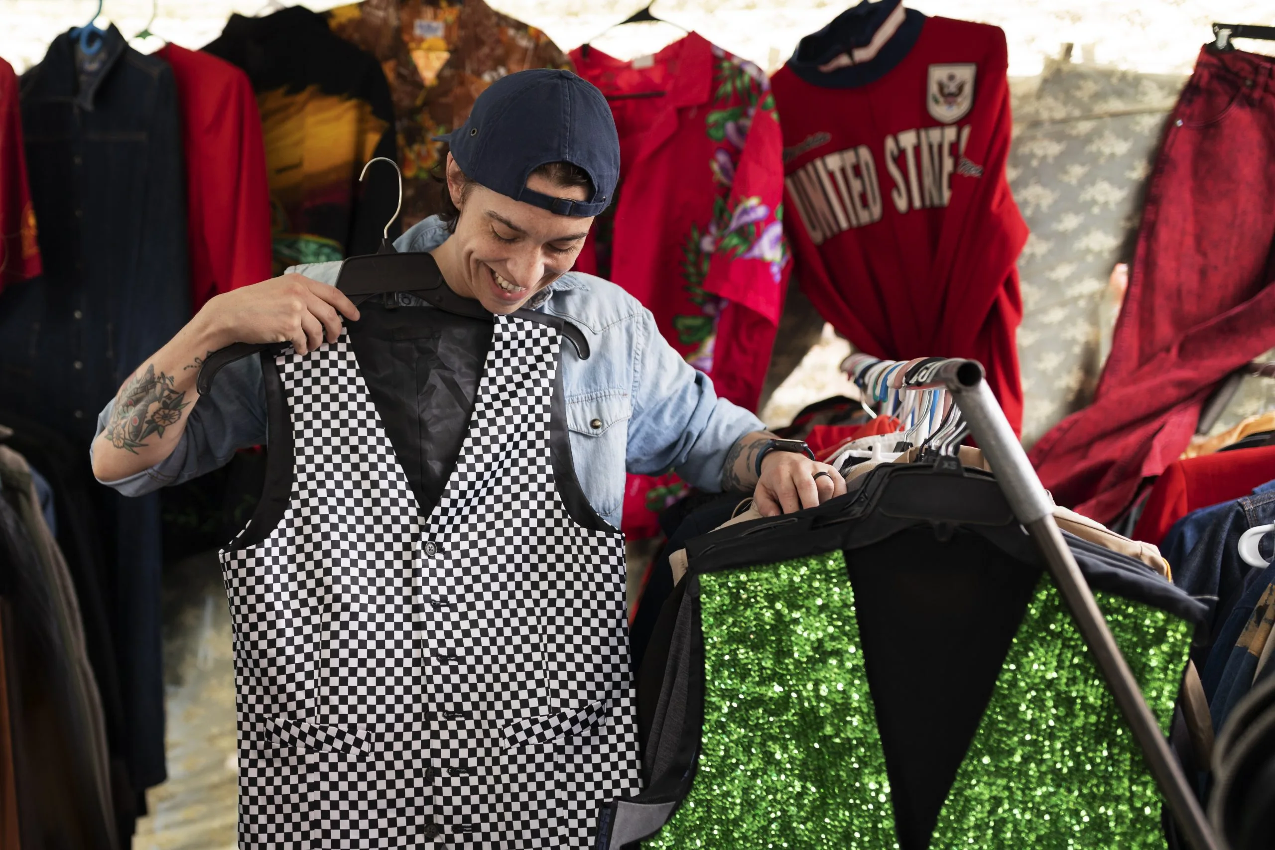USA Outdoor Apparel Market Outlook to 2035 front-view-smiley-man-holding-vest-scaled