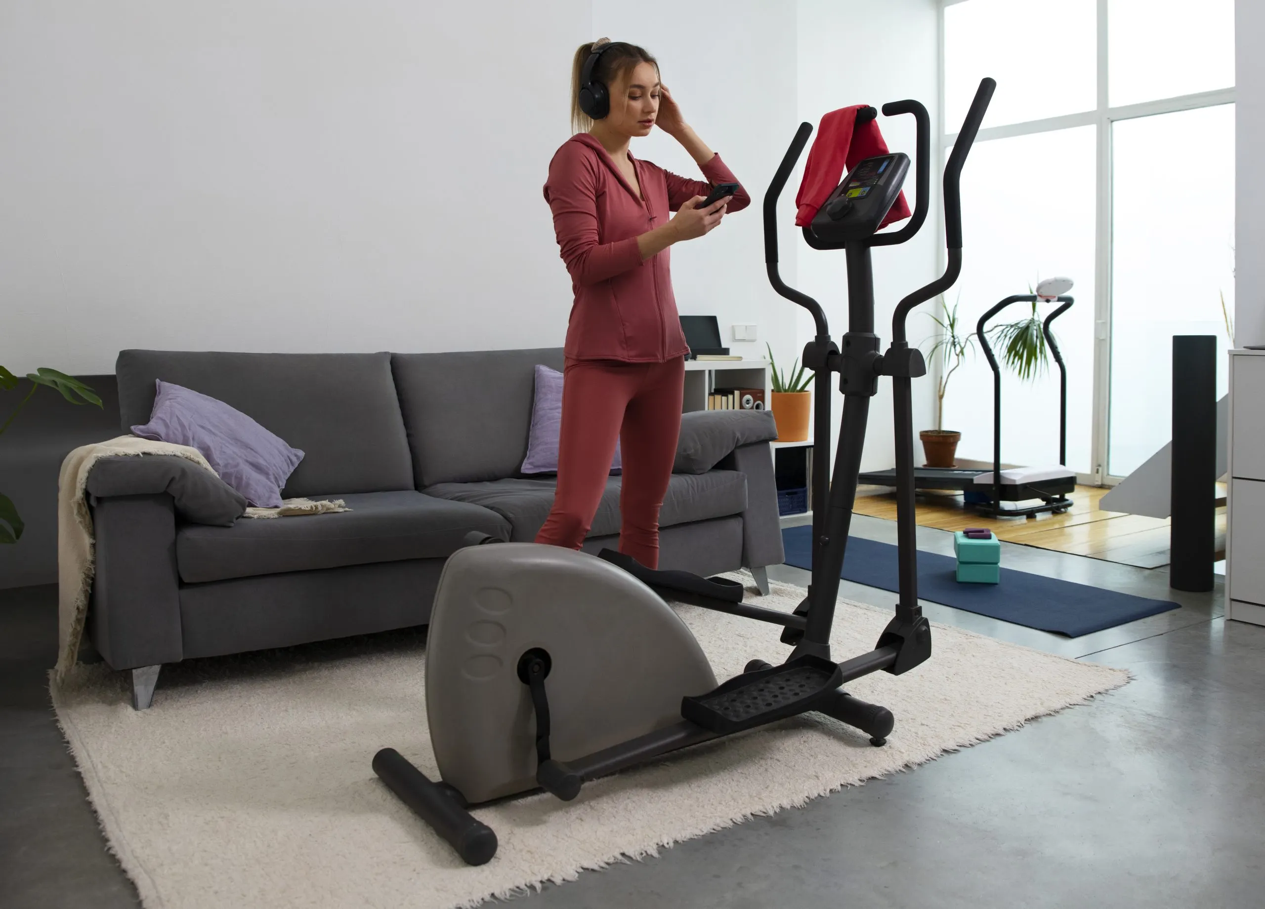 Singapore Home Fitness Equipment Market Opportunities Across Cardio, Strength, and Smart Equipment With 10.2% Growth full-shot-fit-woman-exercising-home-scaled