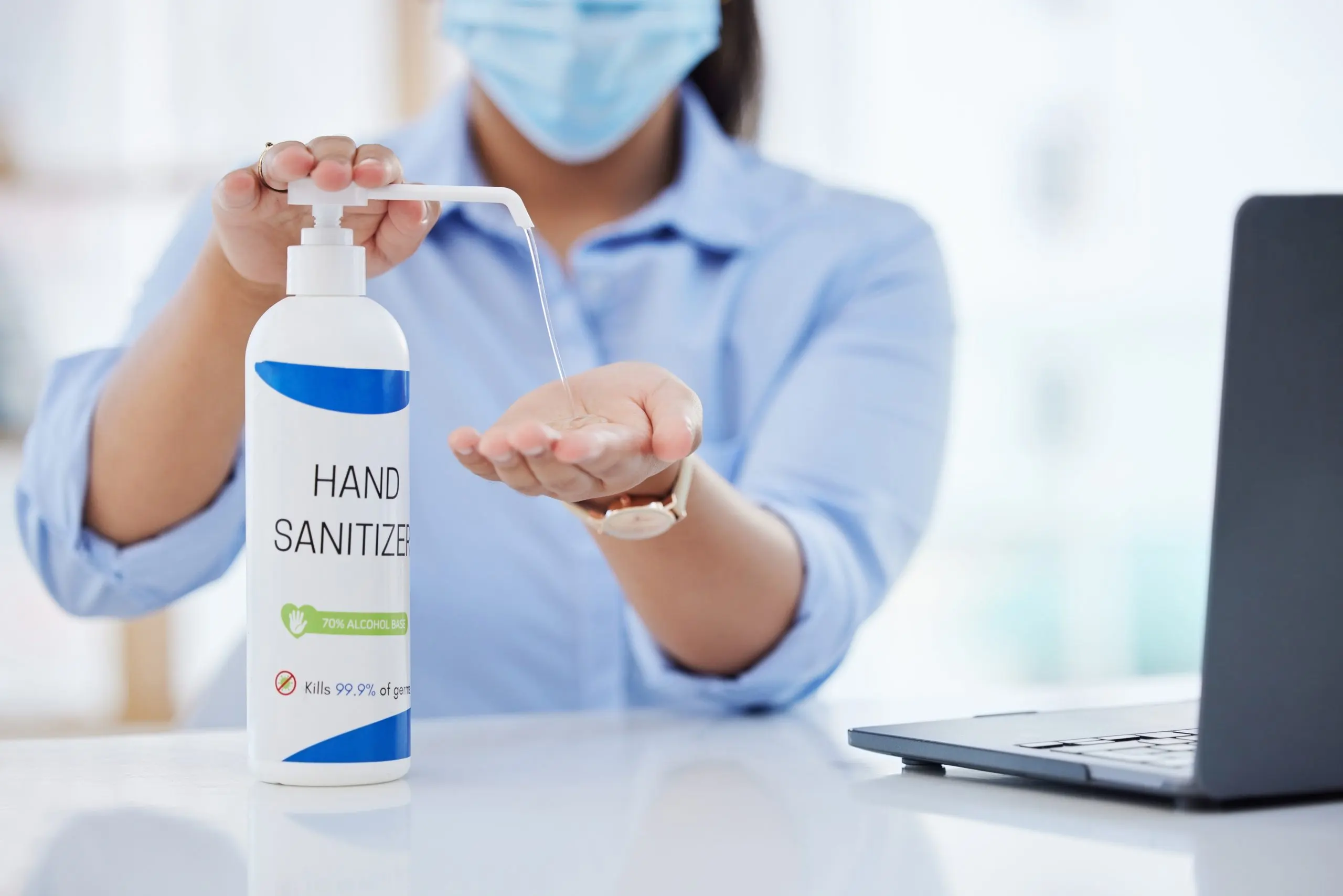South Africa Hand Sanitizer Market Outlook to 2035 hand-sanitizer-covid-woman-with-laptop-working-office-with-face-mask-hygiene-clean-sanitizing-hands-workplace-prevention-covid-19-business-woman-work-with-computer-scaled