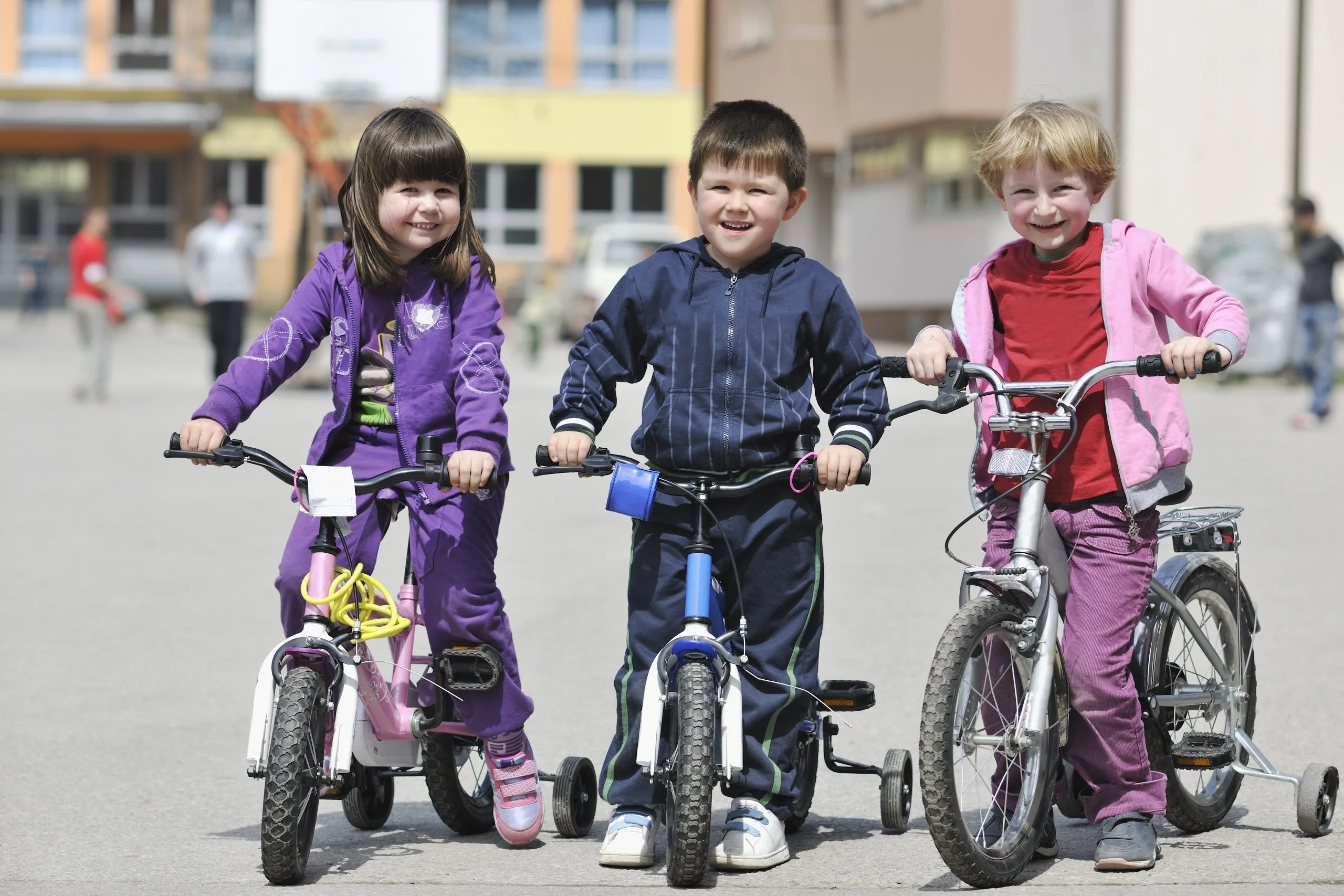 Vietnam Bicycle Market Outlook to 2035 happy-childrens-group-learning-drive-bicycle-outdoor-beautiful-sunny-spring-day-scaled