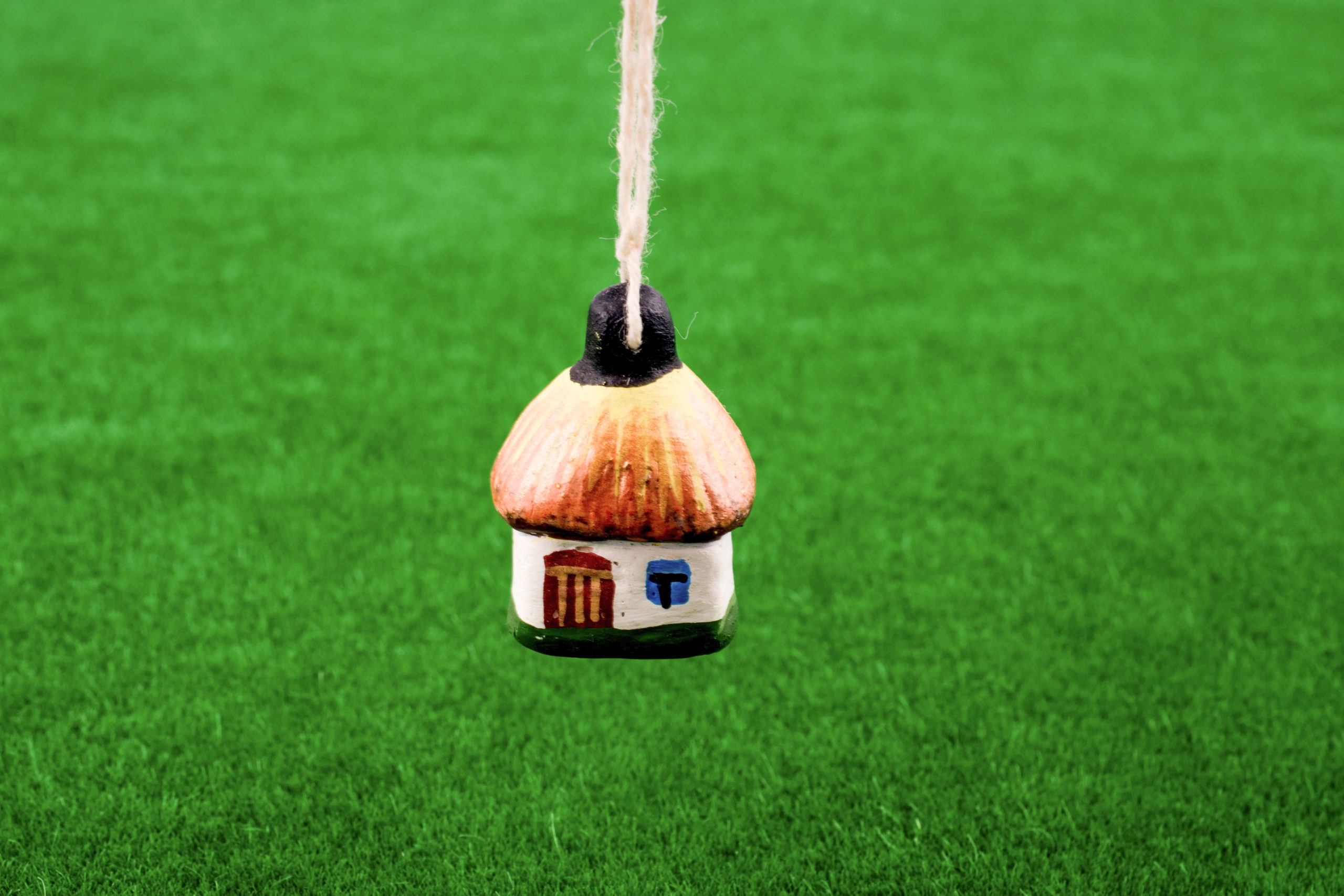 USA Artificial Turf Market Outlook to 2035 littlegift-box-with-ribbon-placed-green-grass-scaled
