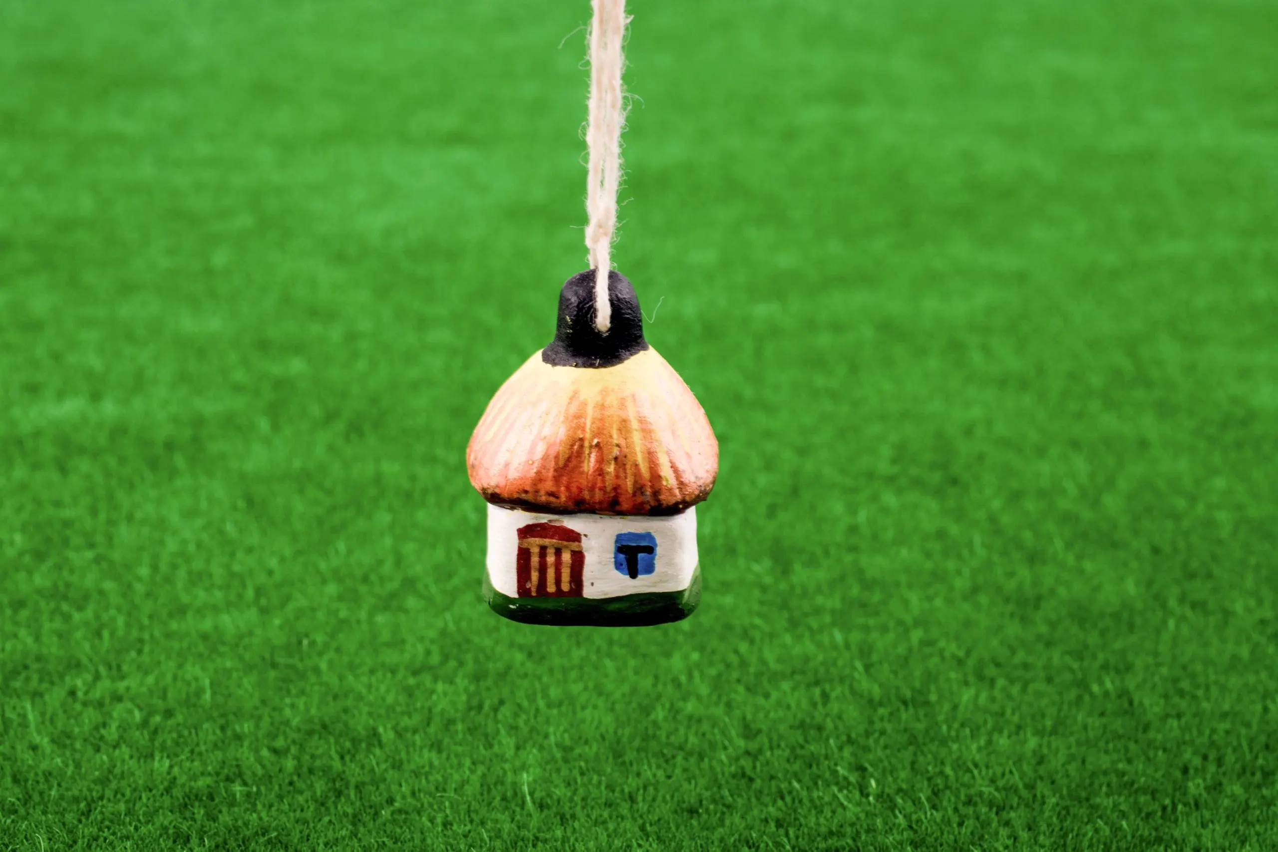 USA Artificial Turf Market Outlook to 2035 littlegift-box-with-ribbon-placed-green-grass-scaled