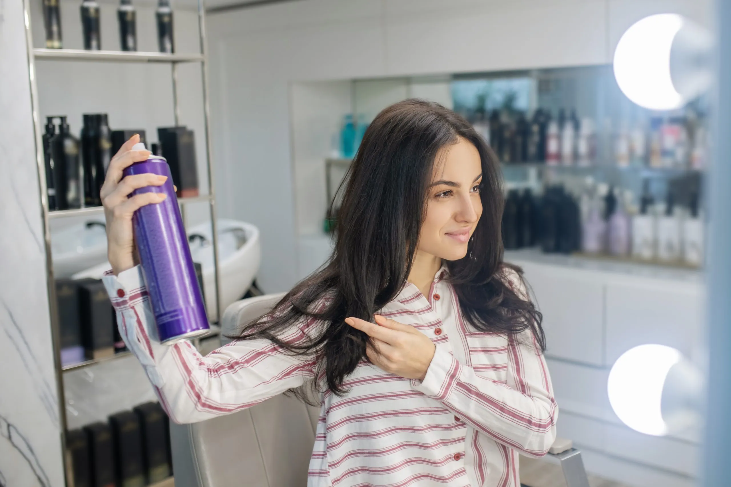 USA Hair Care Market Insights Across Natural, Premium, and Salon Products with USD 35.52 Billion Forecast in the coming years long-haired-young-brunette-spreading-some-hair-spray-her-hair-scaled