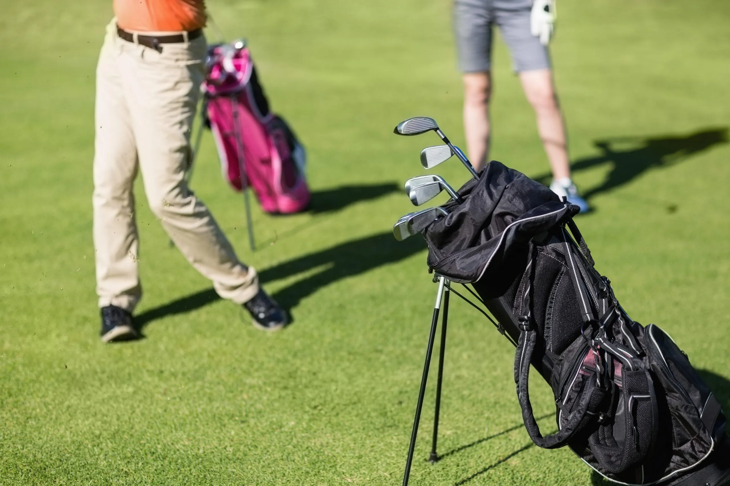 Nigeria Golf Equipment Market Outlook to 2035 low-section-couple-playing-golf-scaled