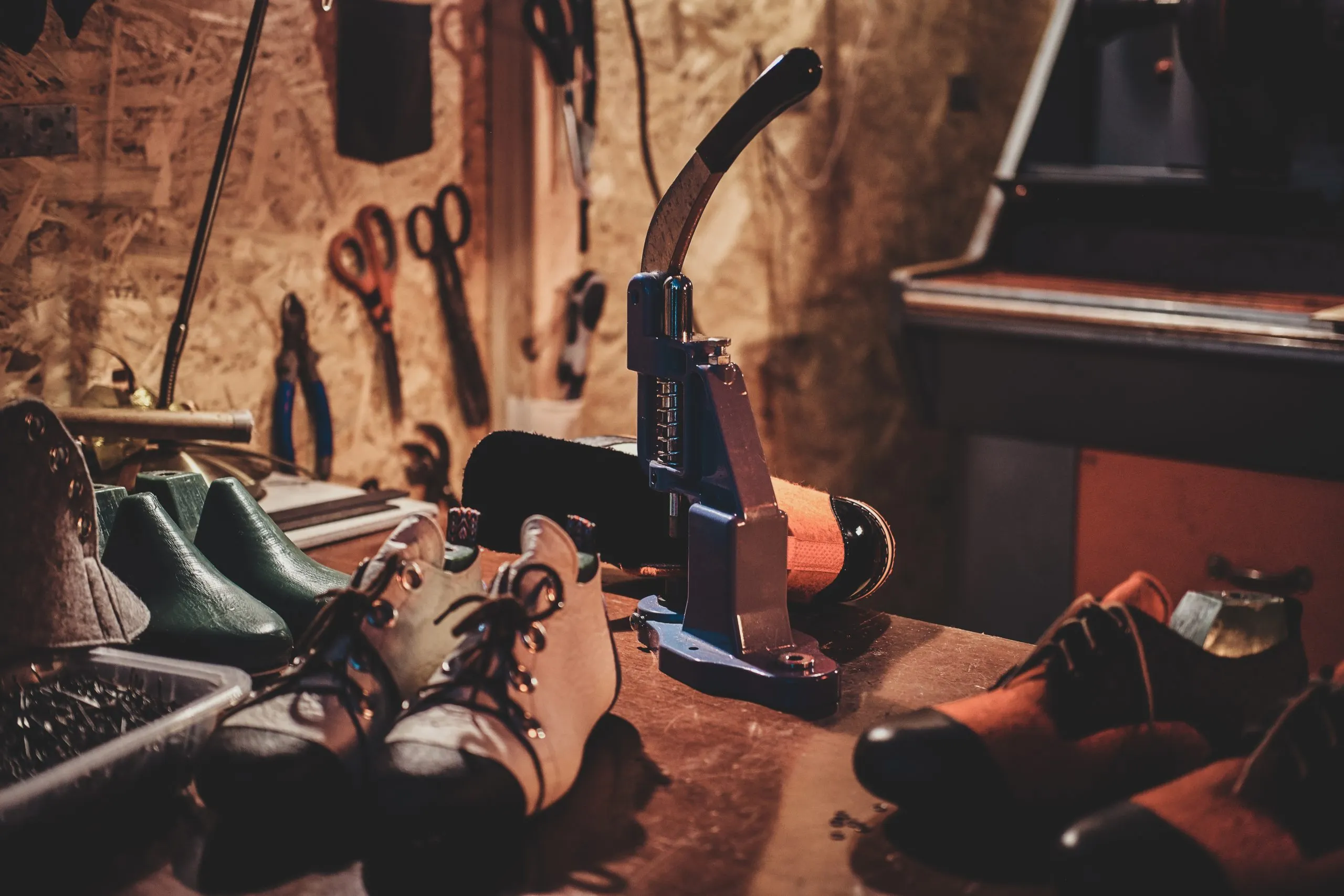 Philippines Industrial Protective Footwear Market Outlook to 2035 machine-tool-table-with-shoes-making-holes-laces-cobbler-s-workshop-scaled