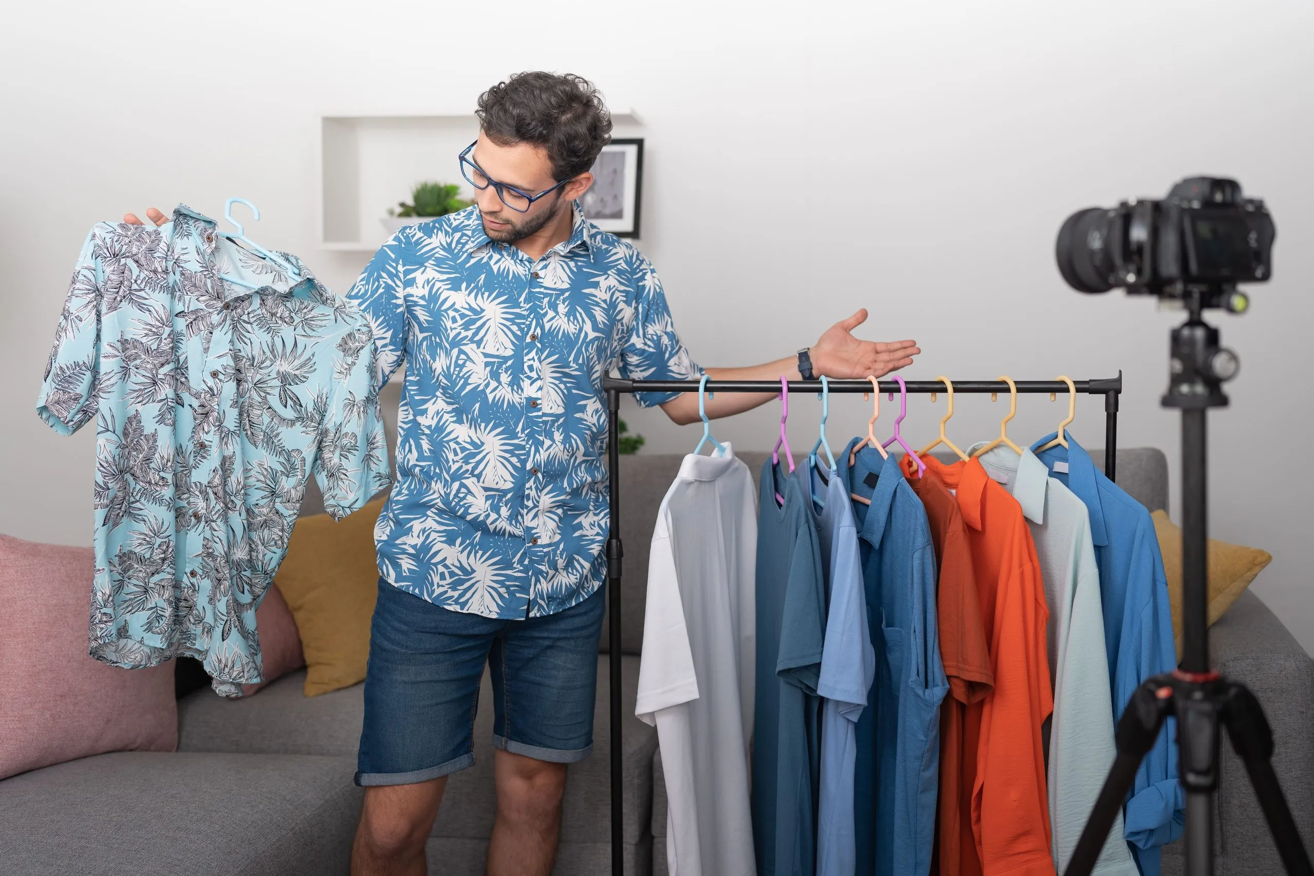 UAE Online Clothing Rental Market Outlook to 2035 male-influencer-showing-off-new-clothes-sent-him-by-his-followers-1-scaled