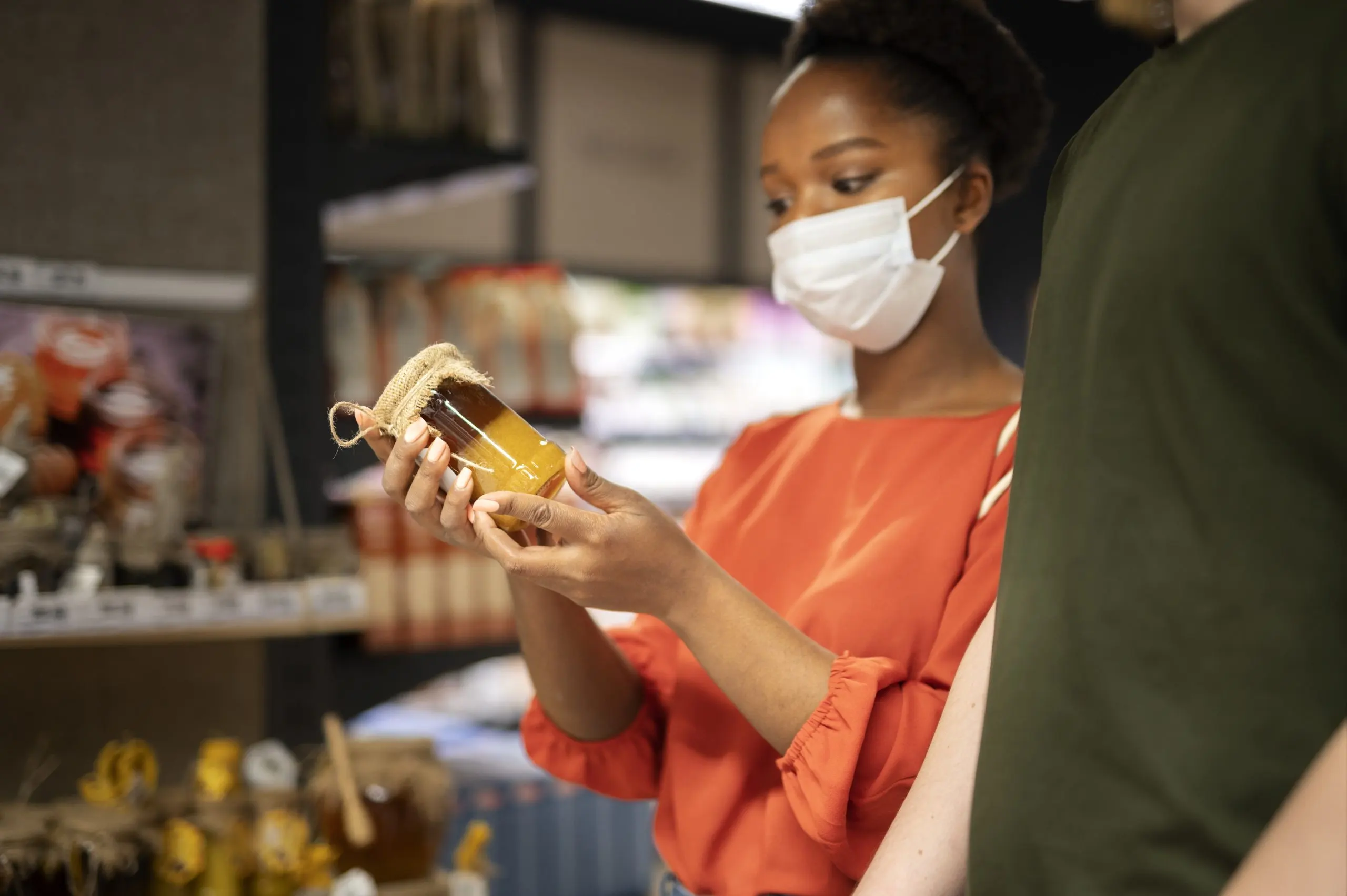 South Africa Dry Shampoo Market Outlook to 2035 man-woman-shopping-grocery-store-while-wearing-medical-masks-scaled