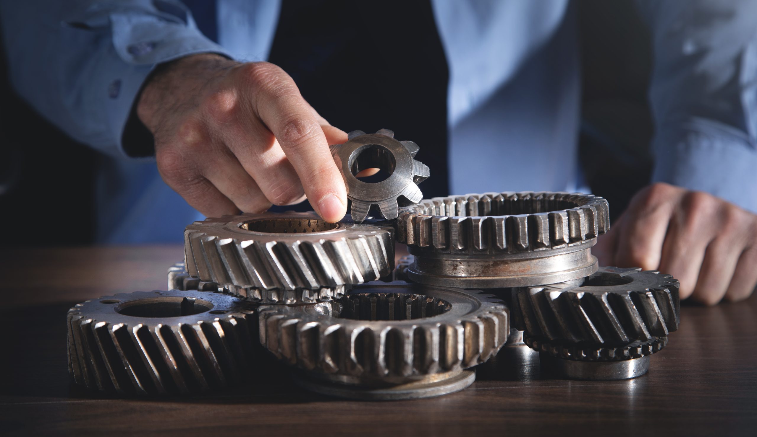Philippines Gearboxes Market Set to Expand with OEM and Aftermarket Growth at 5.8 % CAGR value man-working-with-metal-gear-wheels-1-scaled