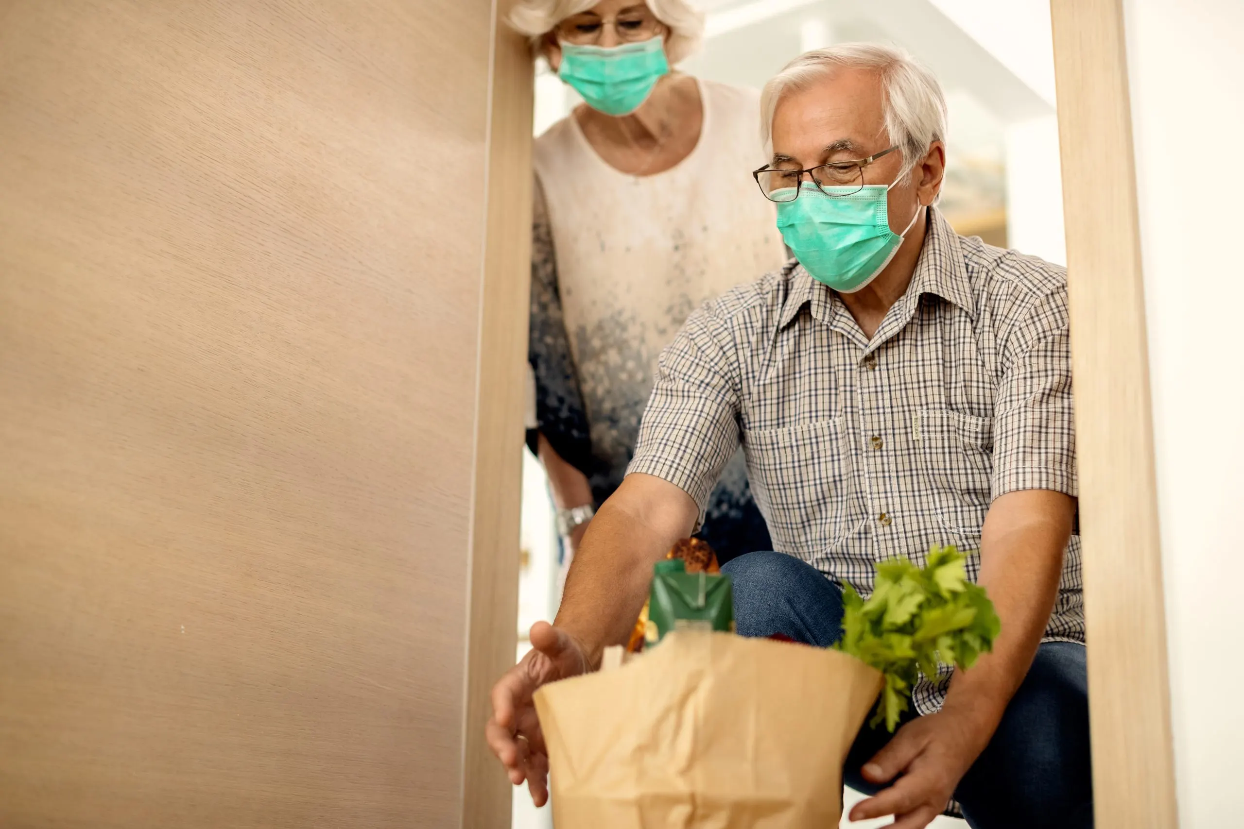 Emerging Opportunities in U.S. Home Care with 7% Annual Growth and $150B Market Size mature-couple-receiving-contactless-grocery-delivery-coronavirus-epidemic-scaled