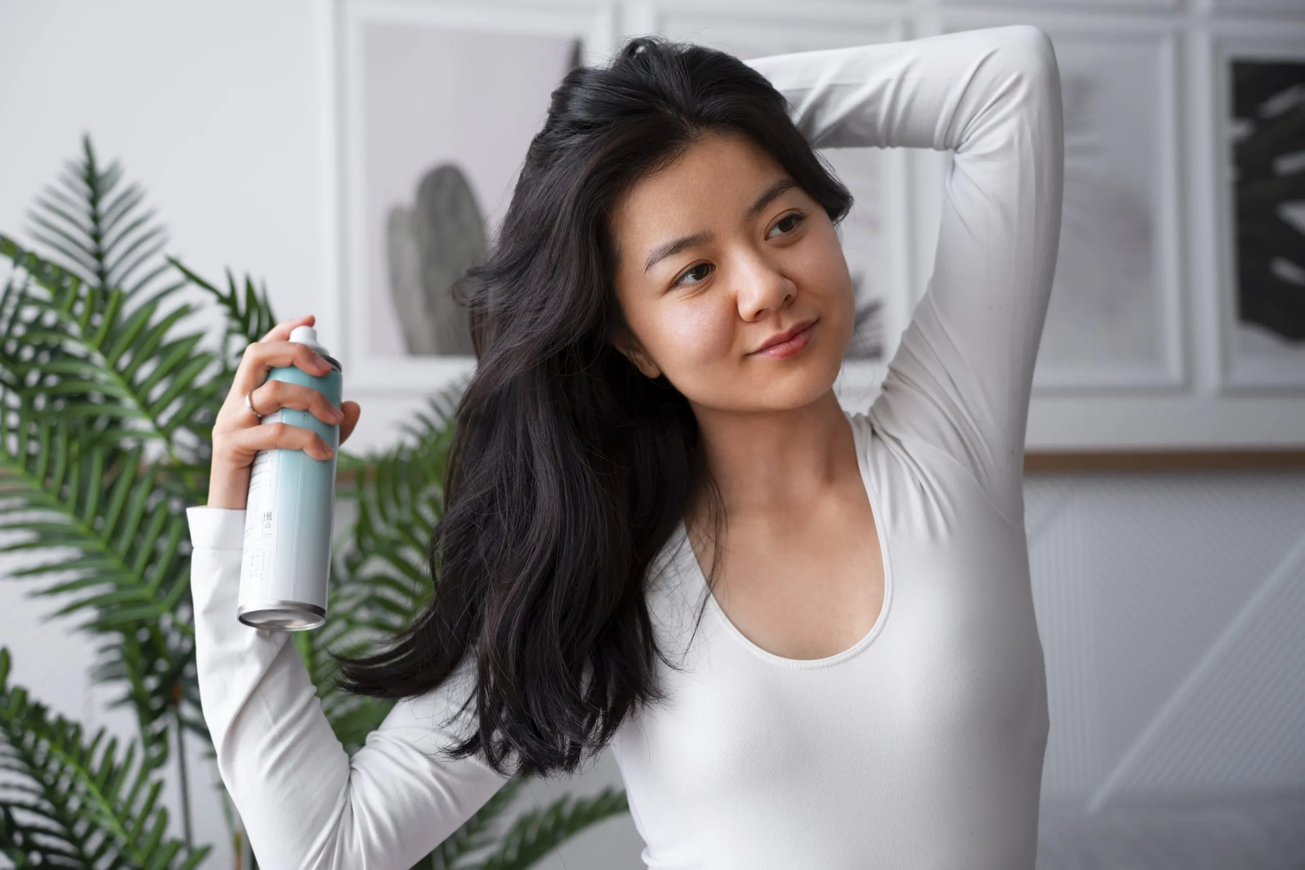 Vietnam Dry Shampoo Market Outlook to 2035 medium-shot-woman-using-dry-shampoo-home-scaled