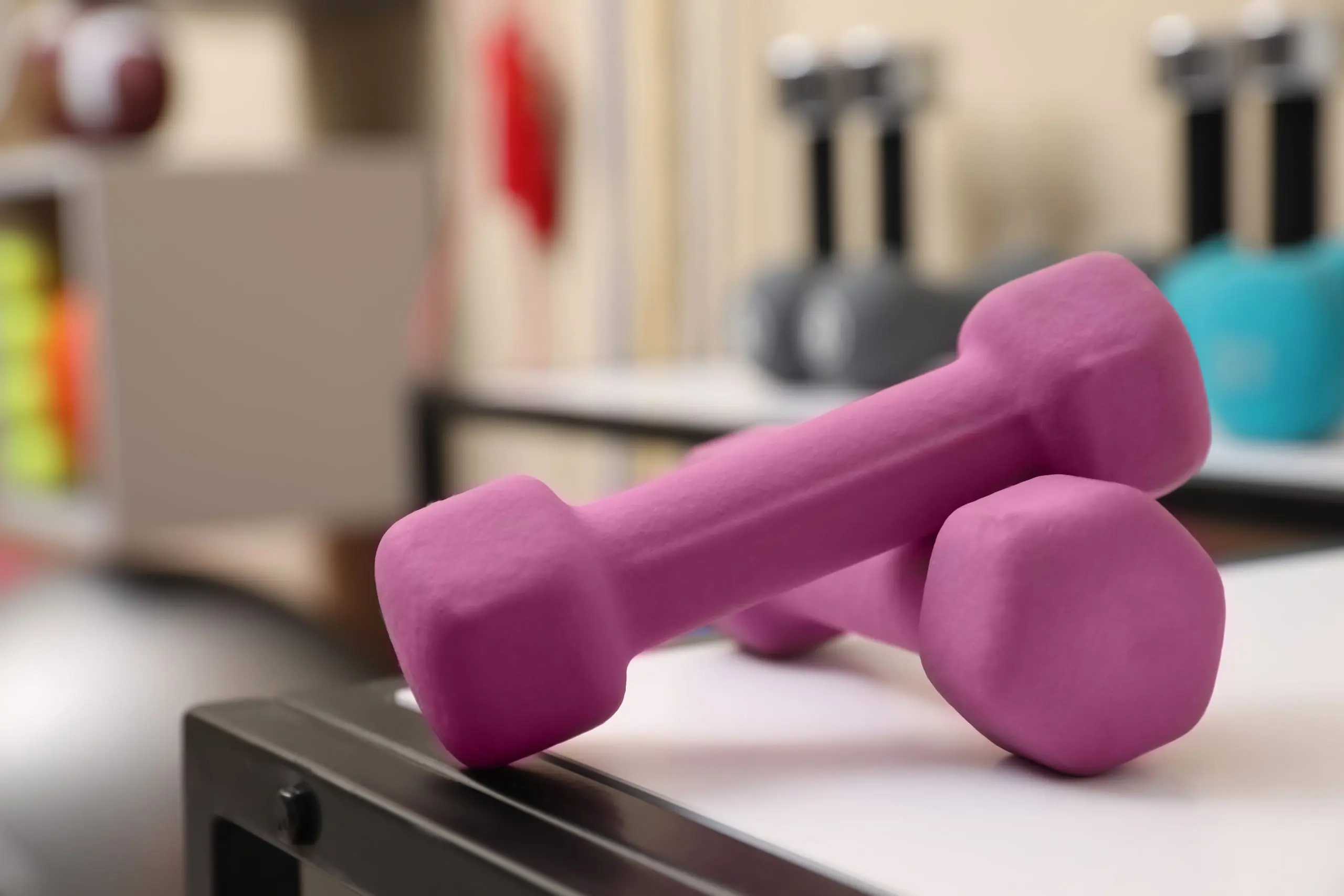 India Home Fitness Equipment Market Growth Supported by USD 1.02 Billion Opportunity pink-dumbbells-white-table-indoors-closeup-sports-equipment-scaled