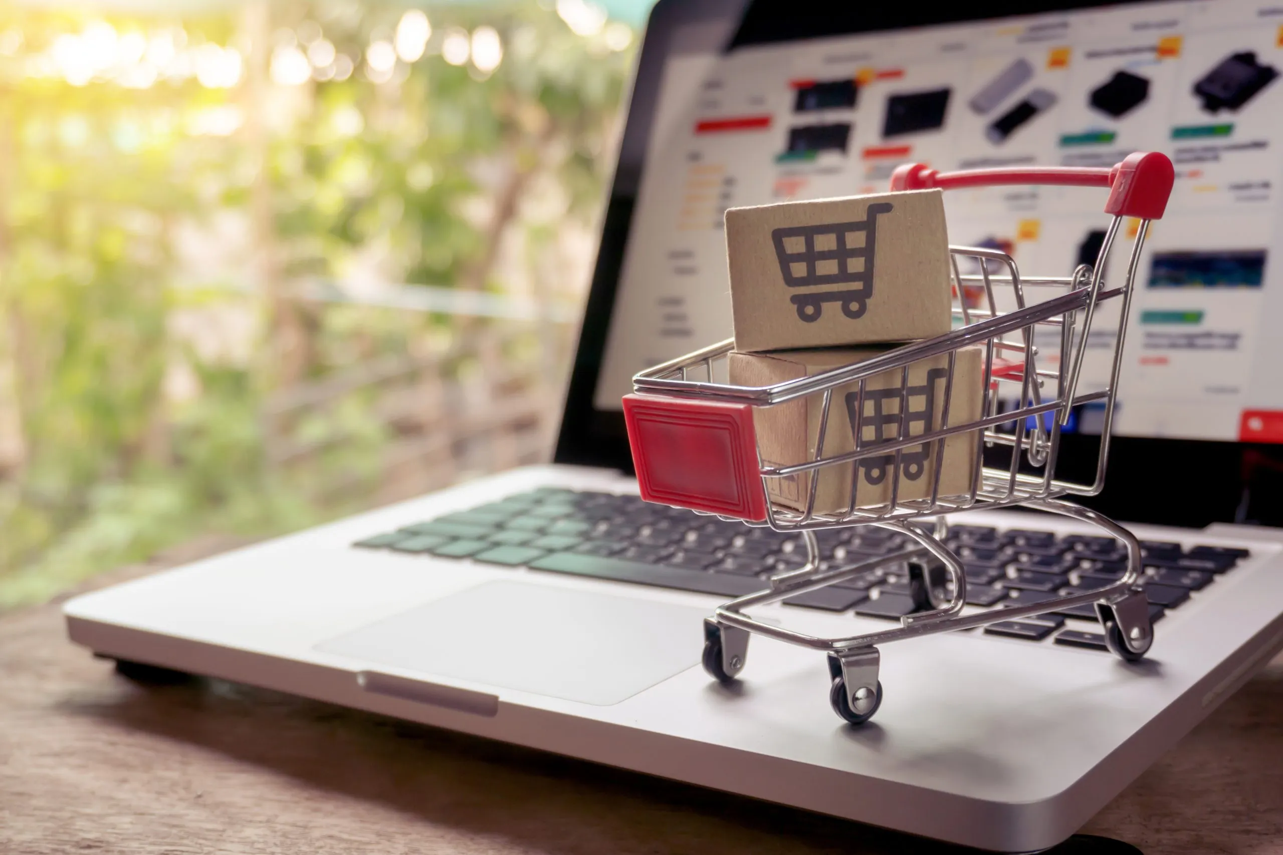 Middle East Ecommerce Market Outlook to 2035 shopping-online-concept-parcel-paper-cartons-with-shopping-cart-logo-trolley-laptop-keyboard-shopping-service-online-web-offers-home-delivery-scaled