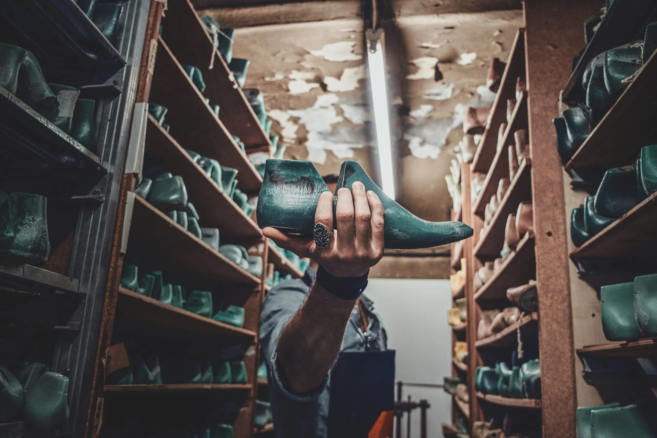 Nigeria Industrial Protective Footwear Market Outlook to 2035 talented-cobbler-finally-found-right-form-shoe-his-new-project-storage-scaled