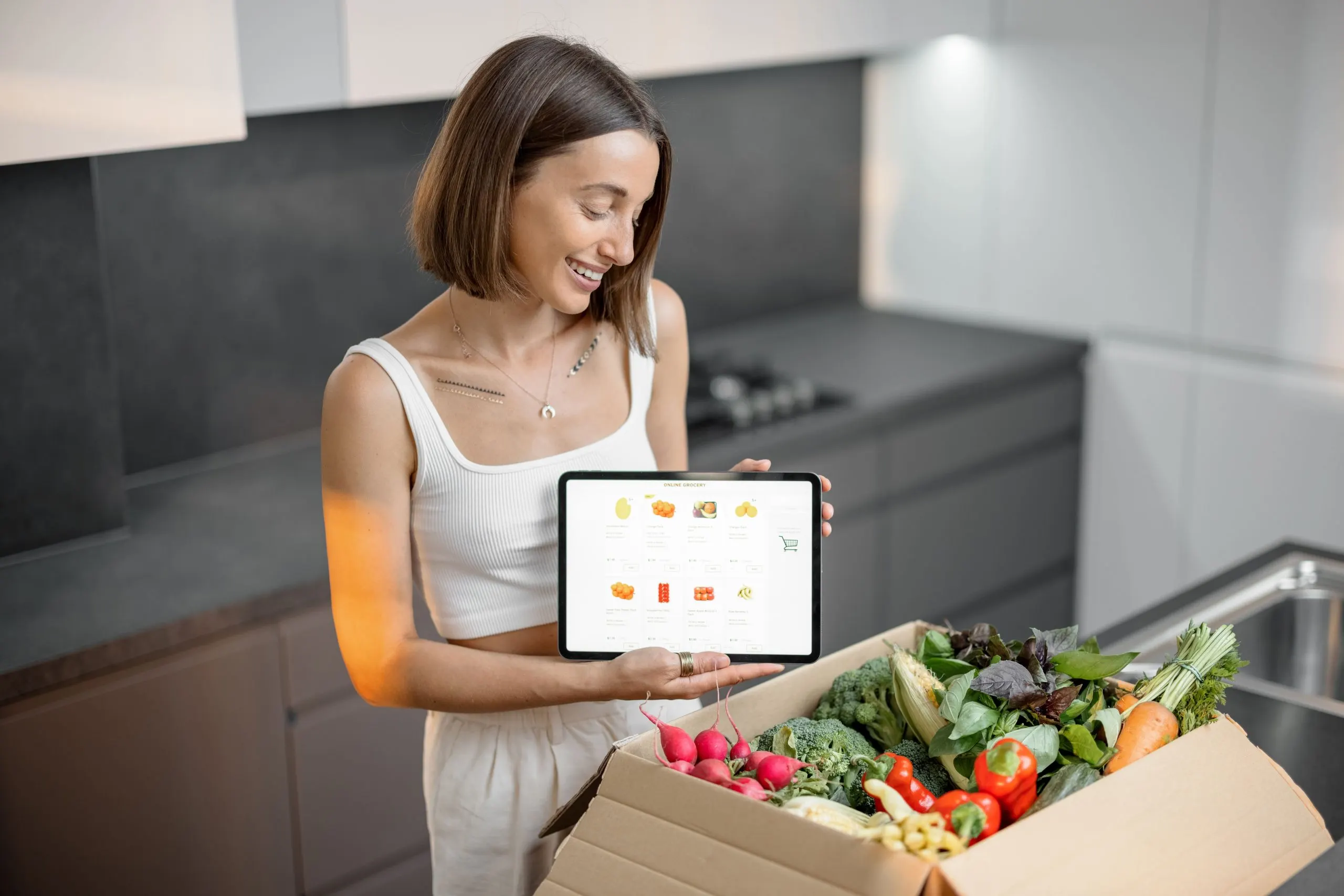 Brazil Online Grocery Delivery Market Outlook to 2035 woman-buying-fresh-vegetables-online-1-scaled