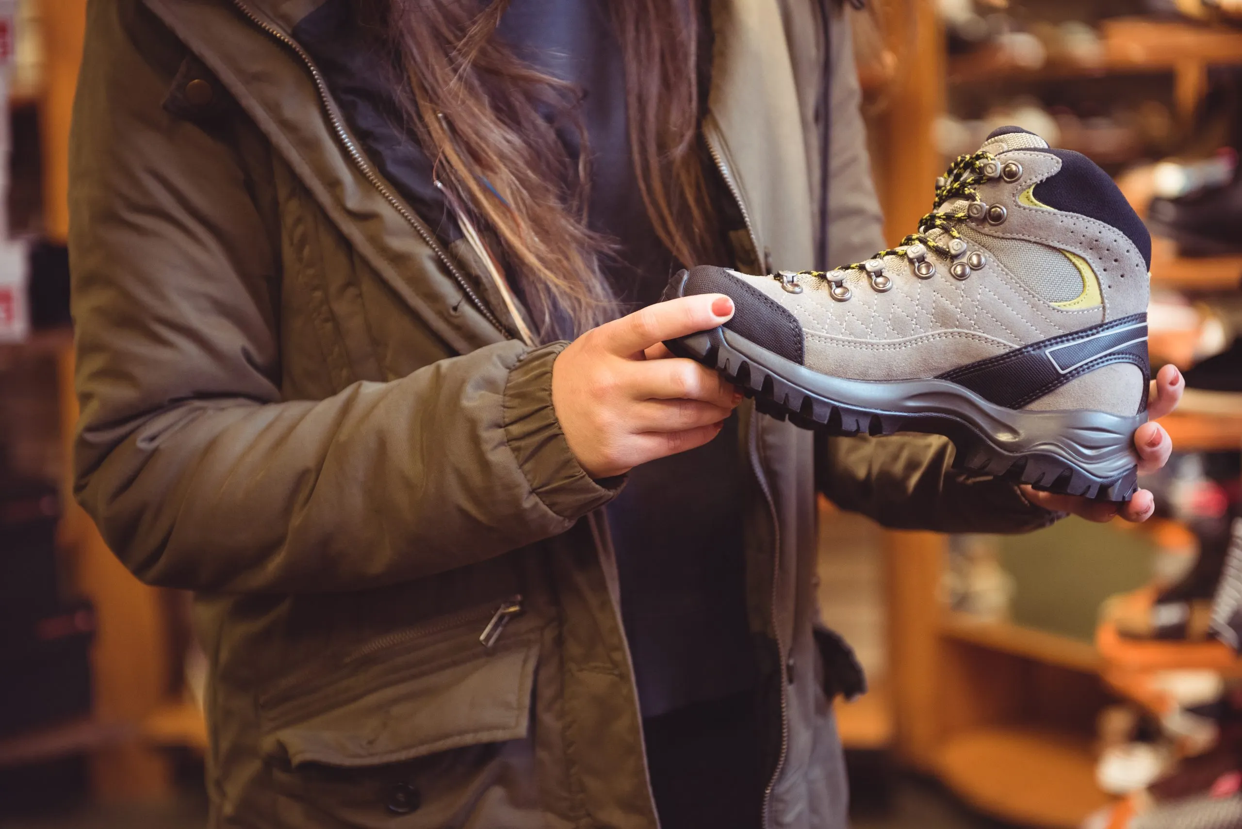 Philippines Industrial Protective Footwear Market Outlook and Workplace Safety Trends with 9.2% PPE CAGR value woman-selecting-shoe-shop-scaled