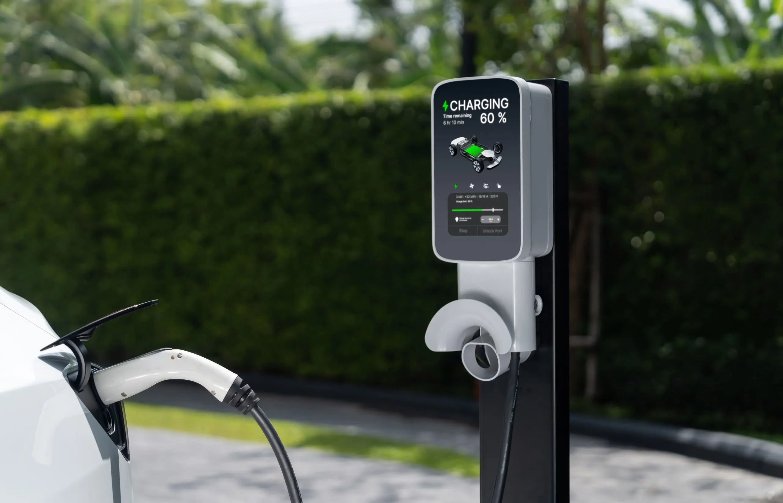 UK Electric Vehicle Market Powered by 20.21% CAGR Growth Across Passenger Cars, Fleets, and Charging Ecosystems young-woman-travel-with-ev-electric-car-green-sustainable-city-innards-scaled