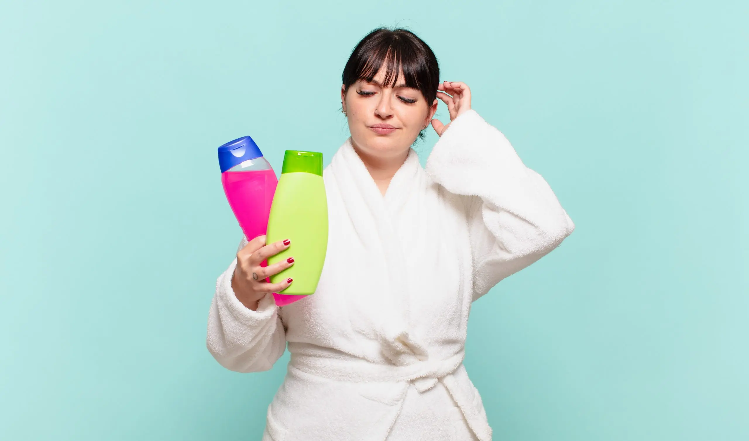 Singapore Dry Shampoo Market Outlook to 2035 young-woman-wearing-bathrobe-feeling-puzzled-confused-scratching-head-looking-side-scaled