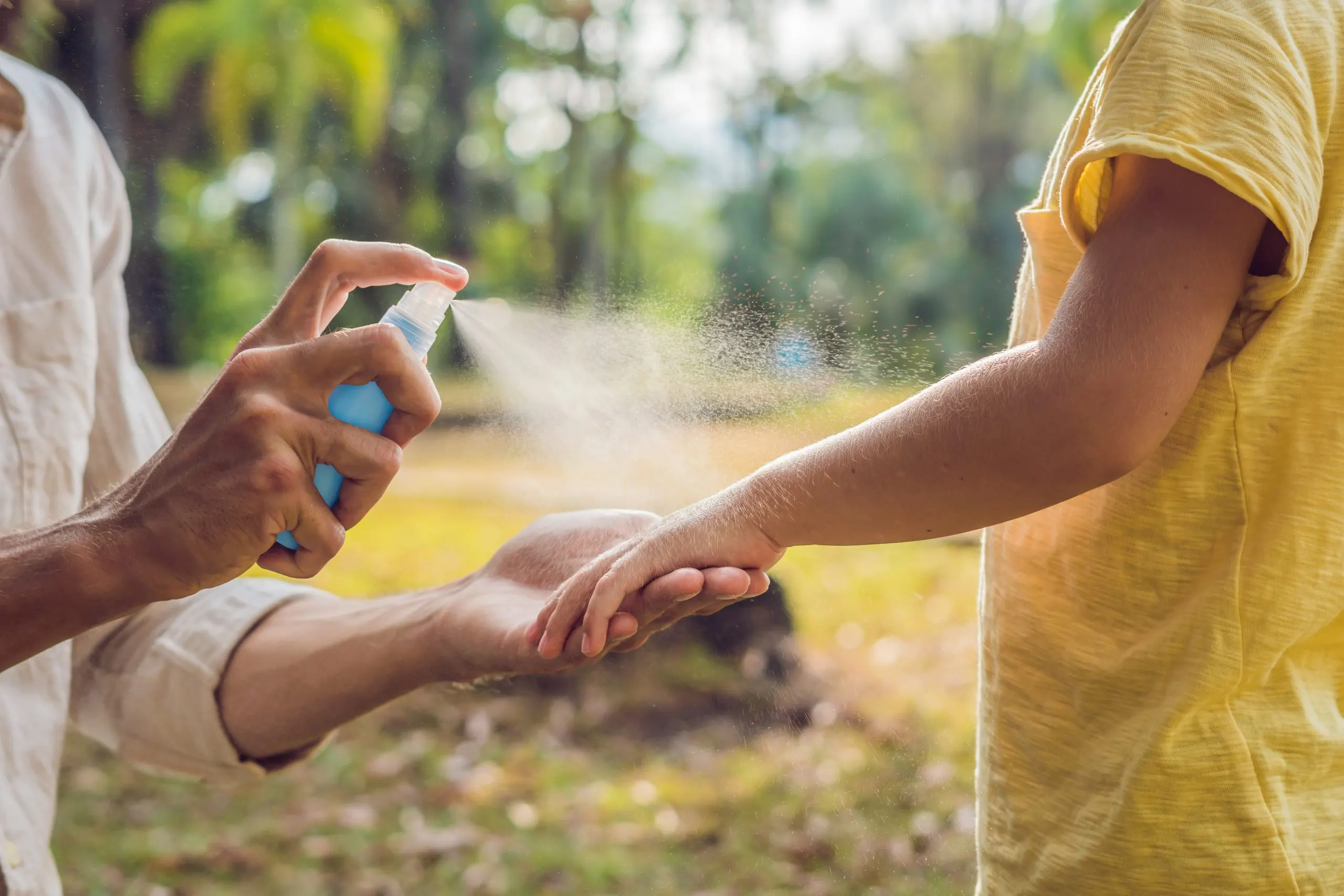 USA Insect Repellent Market Growth Reaches Over 8 Billion with Rising Outdoor Demand dad-son-use-mosquito-spray-spraying-insect-repellent-skin-outdoor-scaled