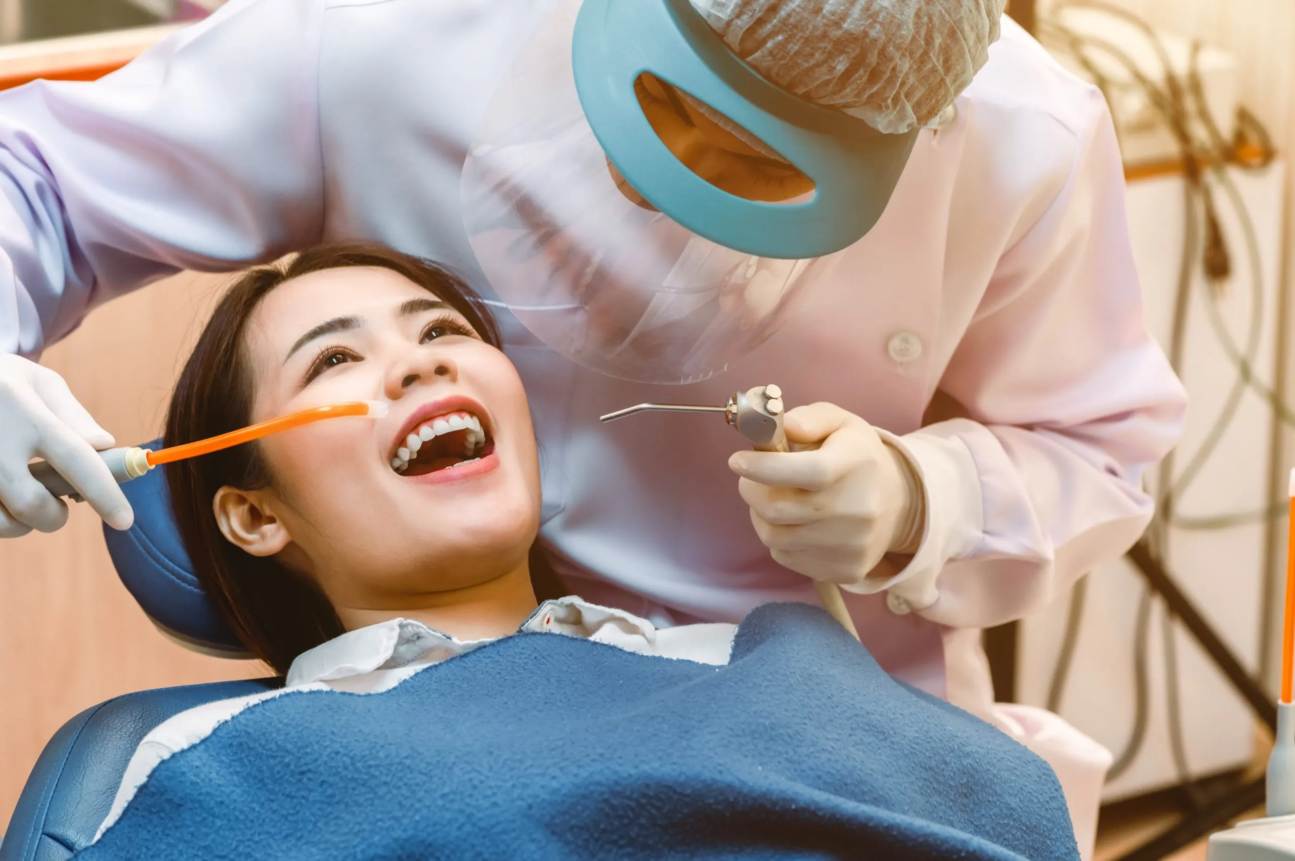 Vietnam Teeth Whitening Market Gains Momentum as Oral Care Market Approaches USD 295 Million dentist-examining-teeth-patients-clinic-better-dental-health-bright-smiledentist-is-scraping-limestonedentist-tools-equipment-scaled