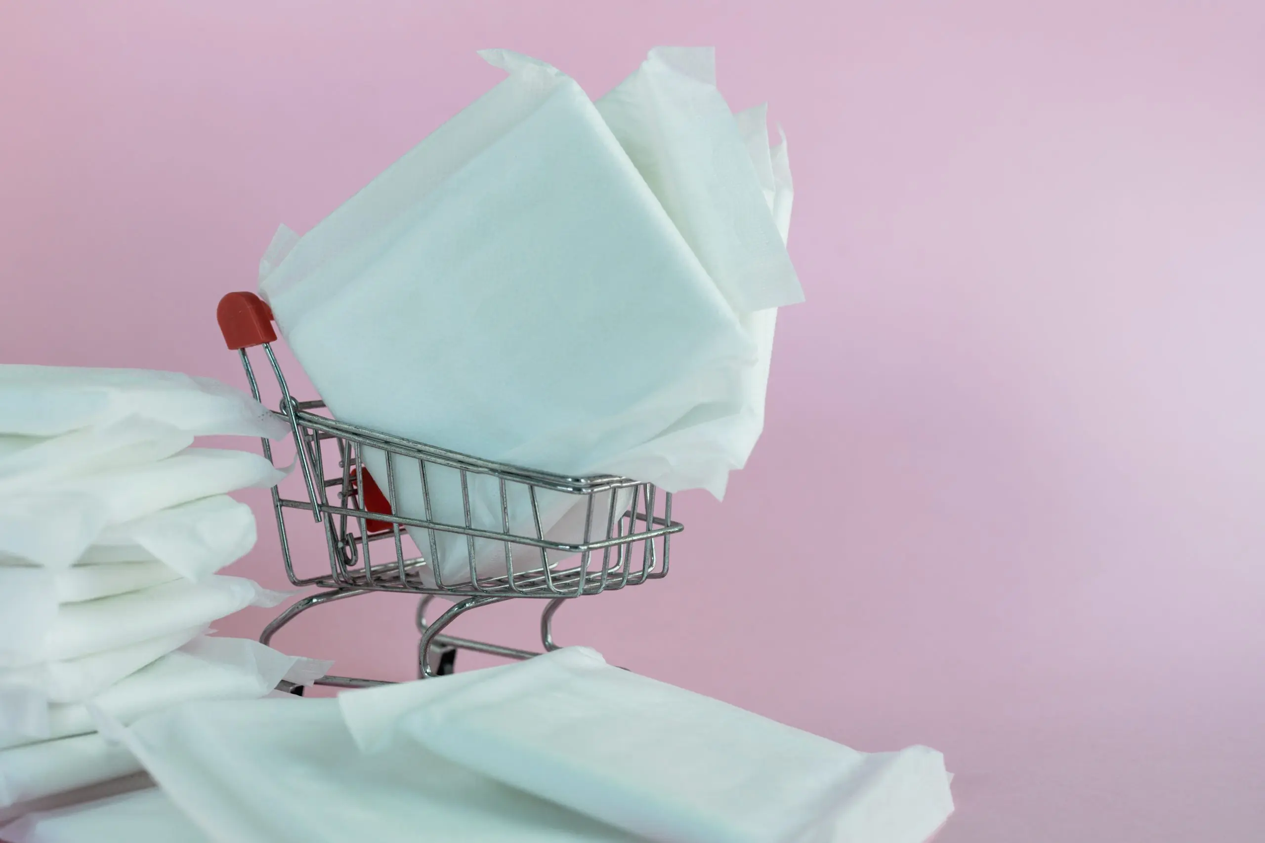 USA Feminine Wipes Market Surpasses 2 Billion Driven by Rising Hygiene Awareness feminine-sanitary-napkin-pink-background-scaled