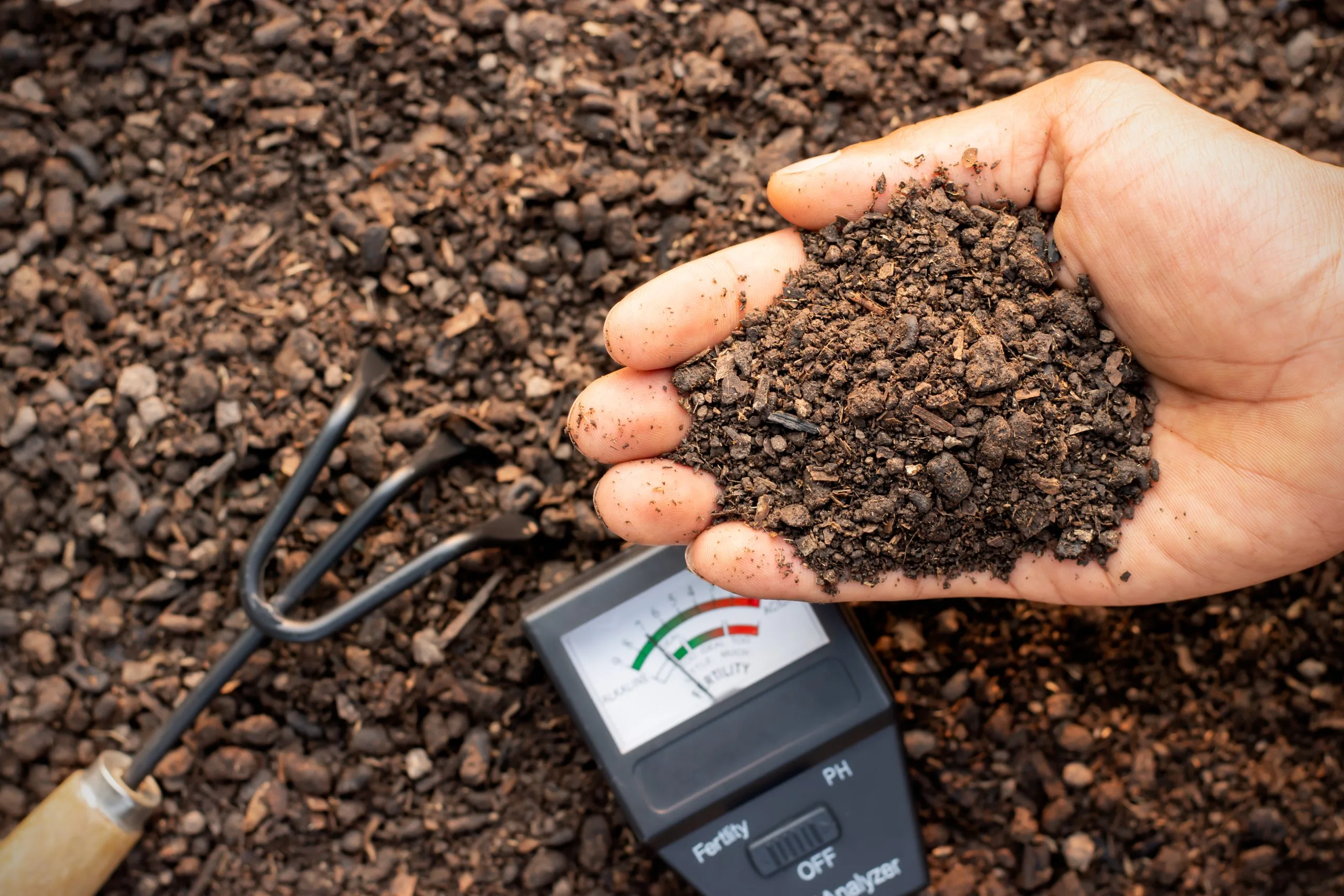 KSA Controlled Release Fertilizer Market Outlook to 2035 fertile-loam-hands-farmer-man-soil-measurement-place-scaled