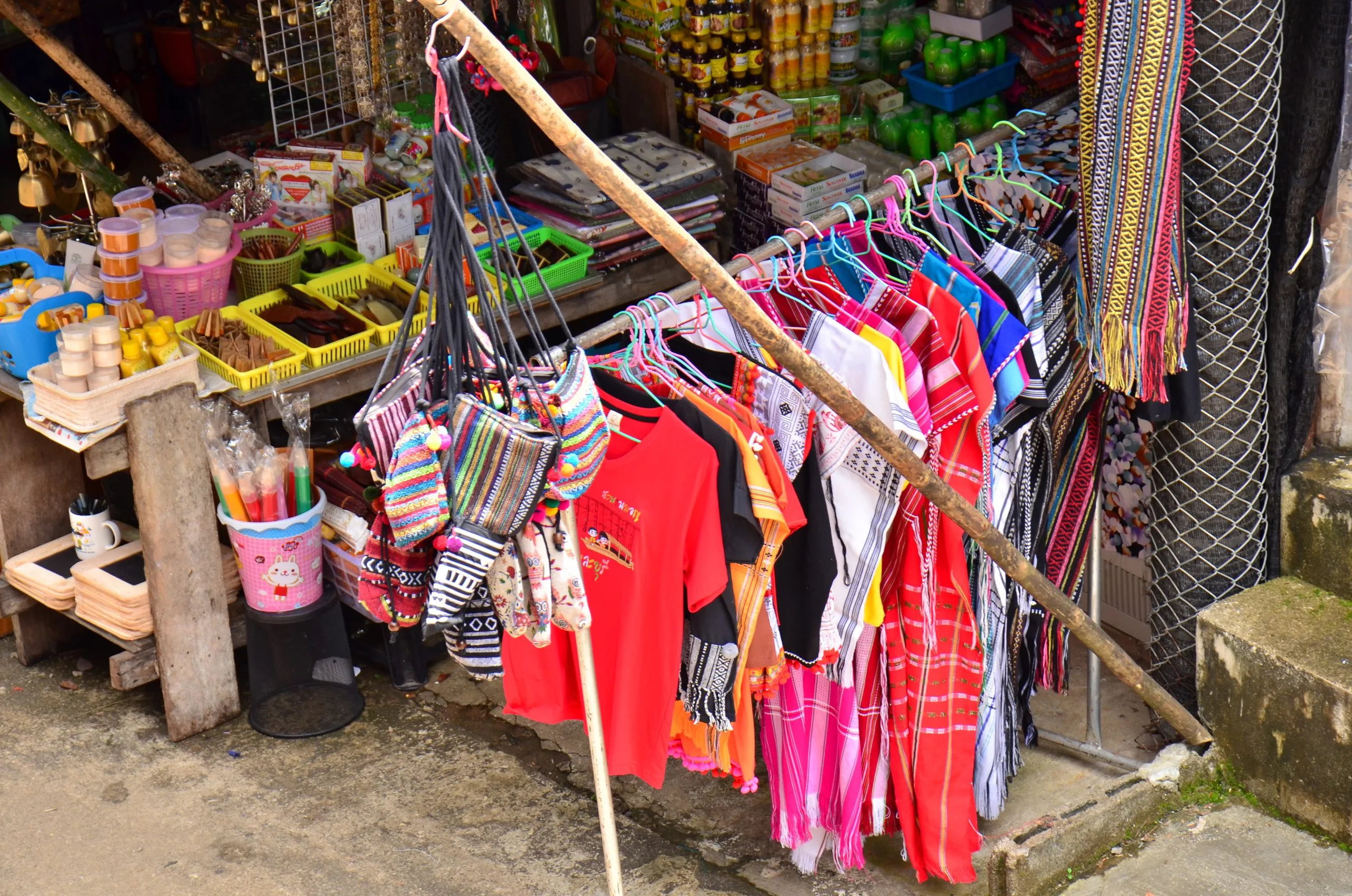 Vietnam Outdoor Apparel Market Grows with Over 50 Percent Urban Participation in Outdoor Activities high-angle-view-clothes-hanging-store-sale-scaled