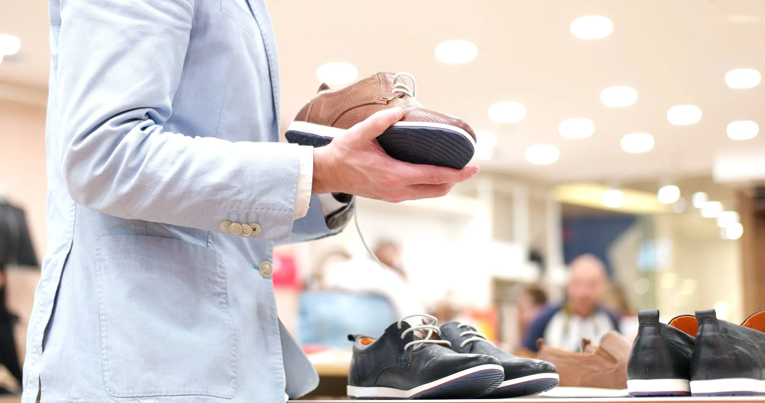 KSA Sports Shoes Market Gains Momentum as Footwear Industry Crosses 2.4 Billion USD man-changing-look-with-new-shoes-scaled