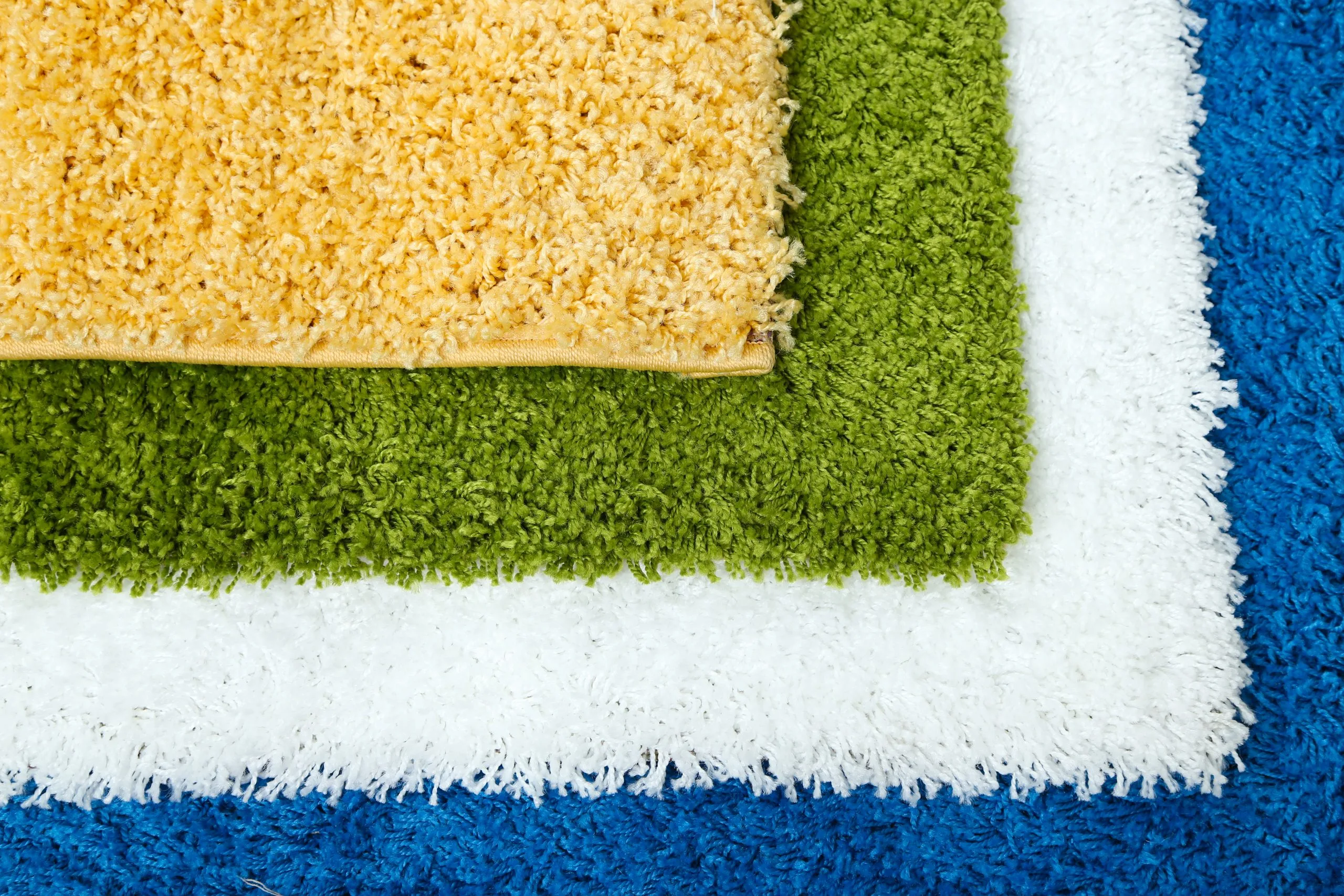 Brazil Artificial Turf Market Expands with Over 8 Percent CAGR Driven by Sports Demand many-carpets-different-colors-closeup-scaled